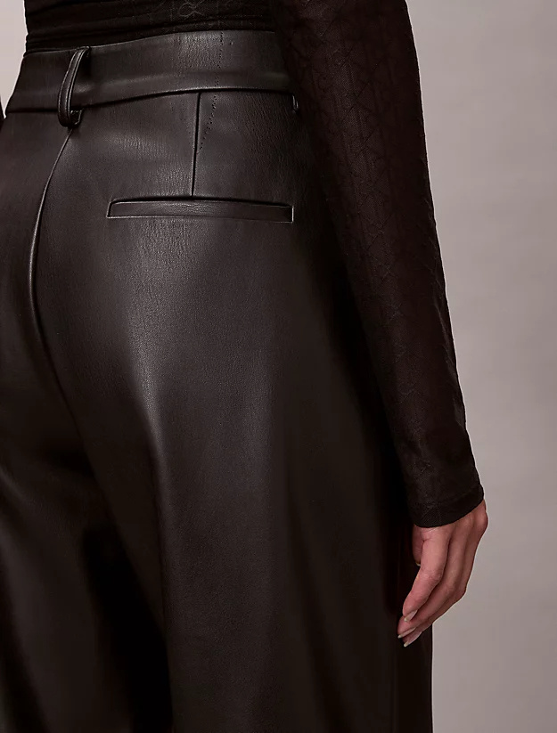 Calvin Klein Faux Leather Pleated Trousers In Black