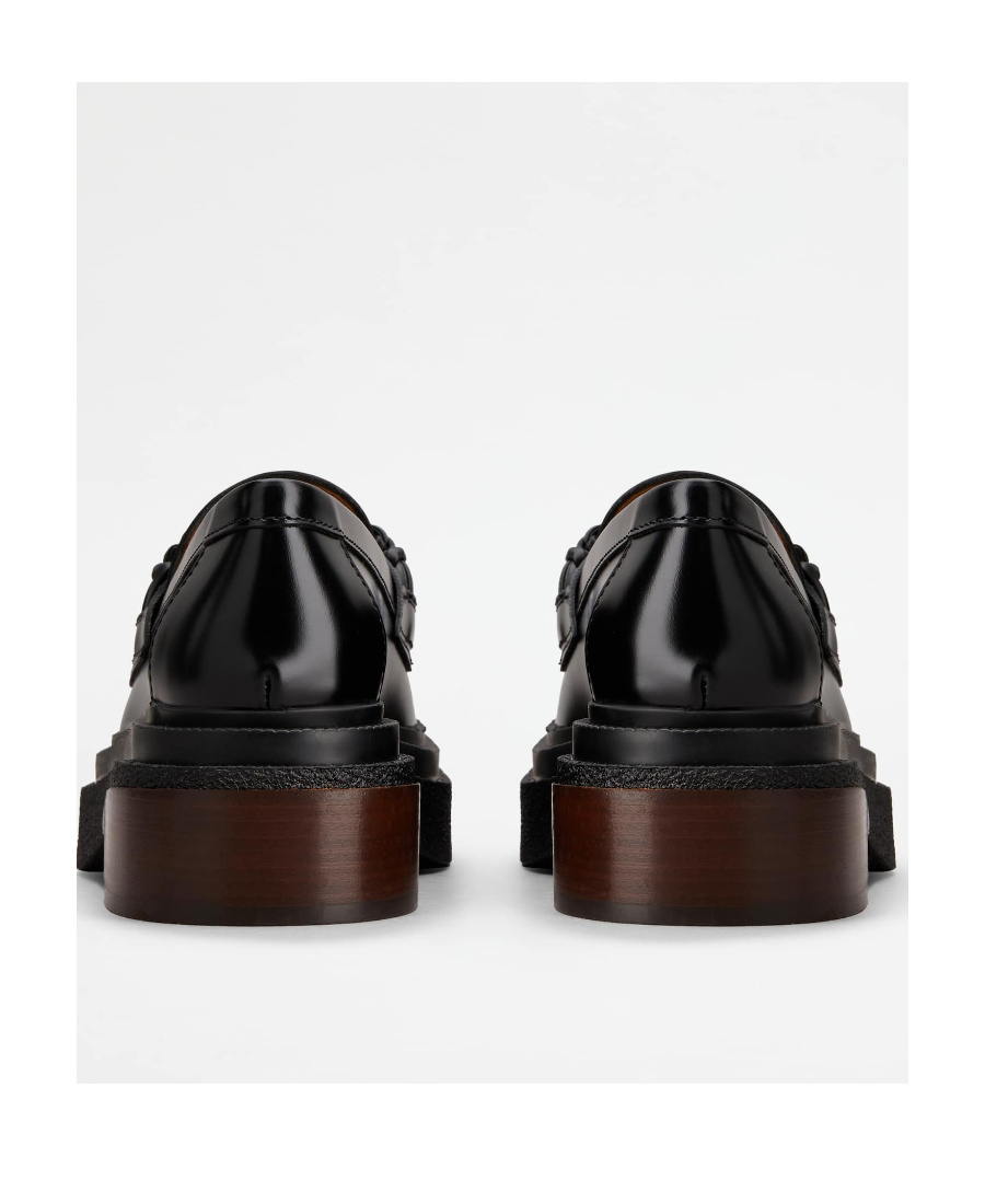 Shop Tod's Almond-toe Leather Loafers In Black