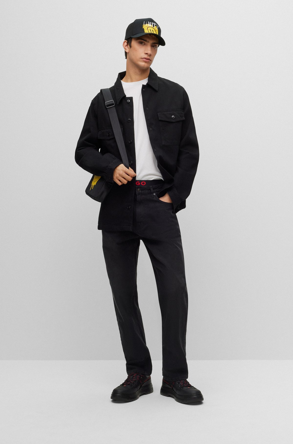 Hugo Boss Smiley-print Mid-rise Slim-fit Jeans In Black