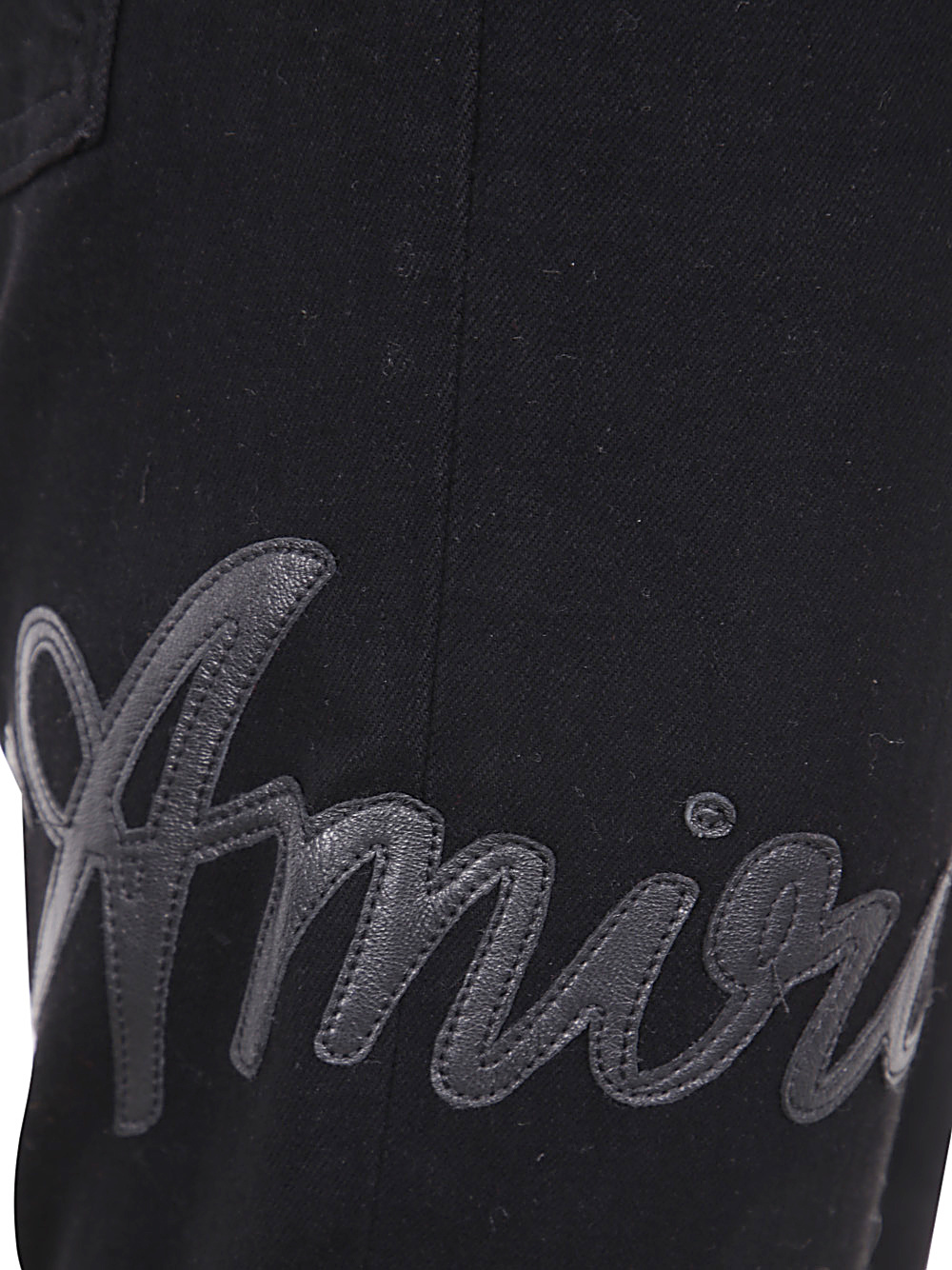 Amiri Logo Skinny Jeans In Black