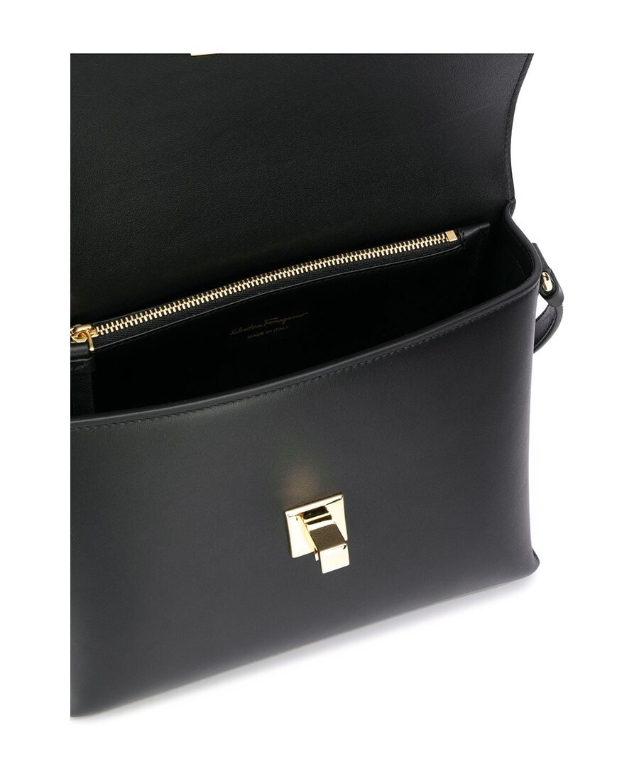 Shop Ferragamo Vara Turn-on Cross-body Bag In Black