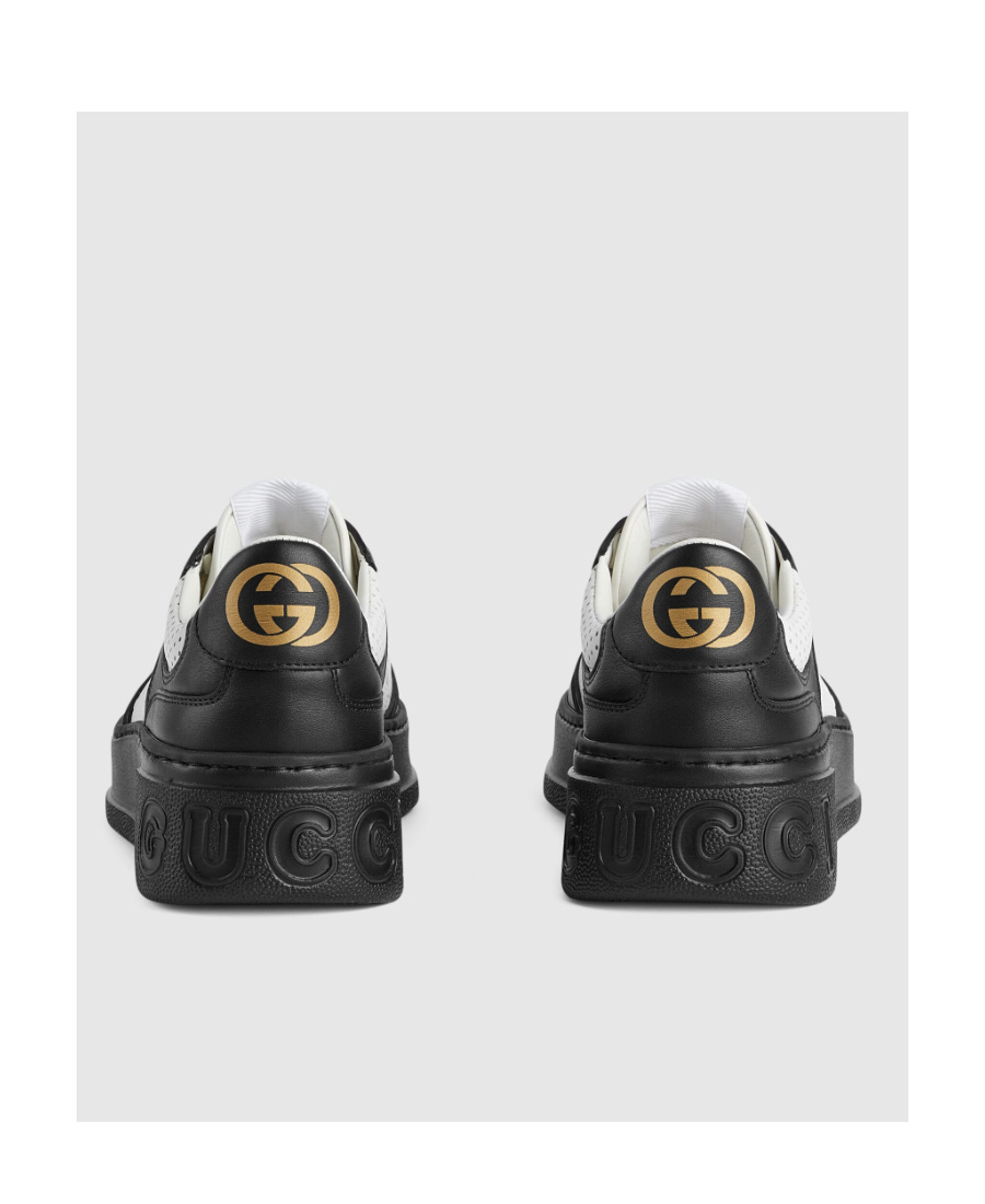 Gucci Gg Embossed Low-top Sneakers In Black