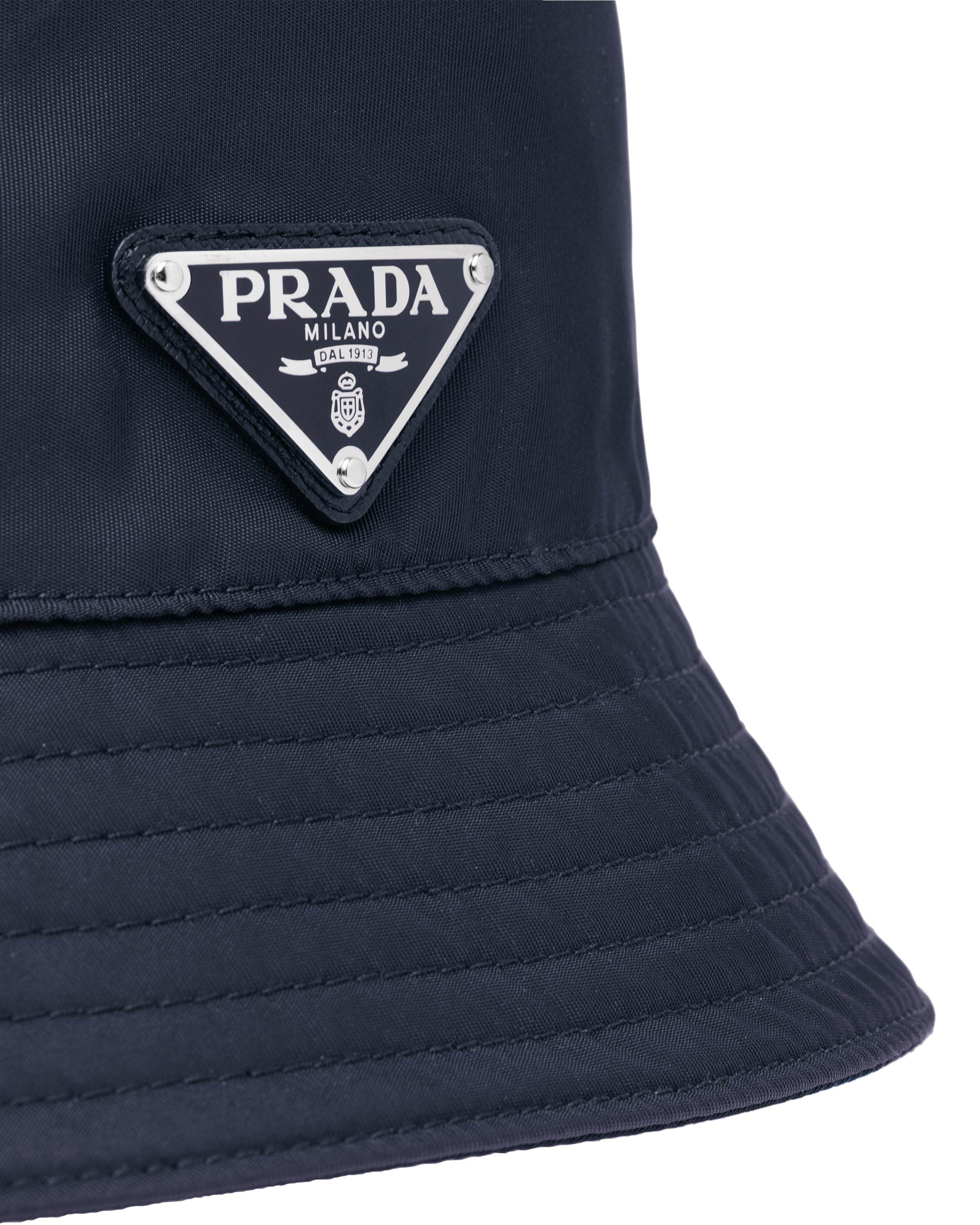 Prada Logo Plaque Wool Bucket Hat In Black