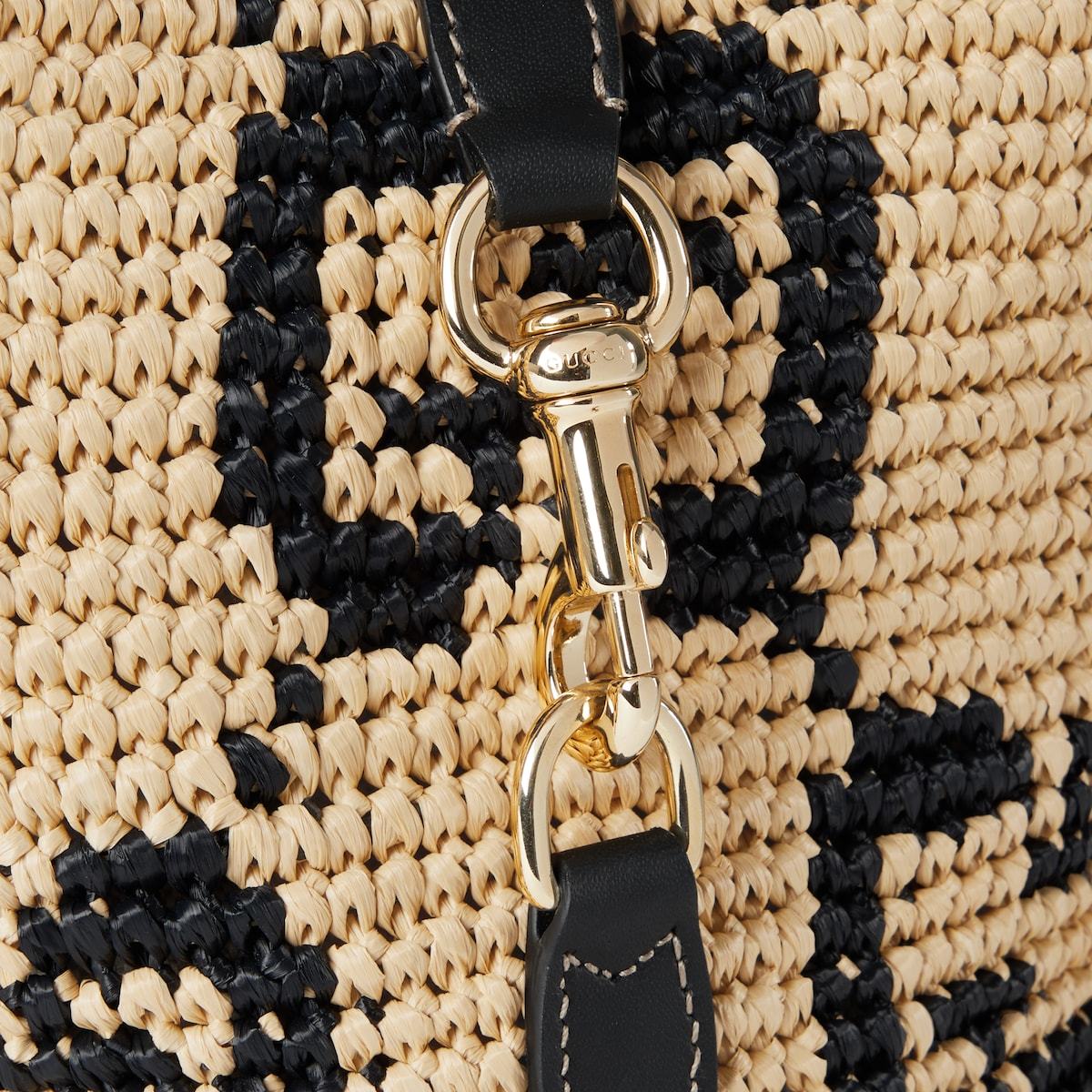 Gucci Gg Super Mini Bucket Bag In Natural And Black
