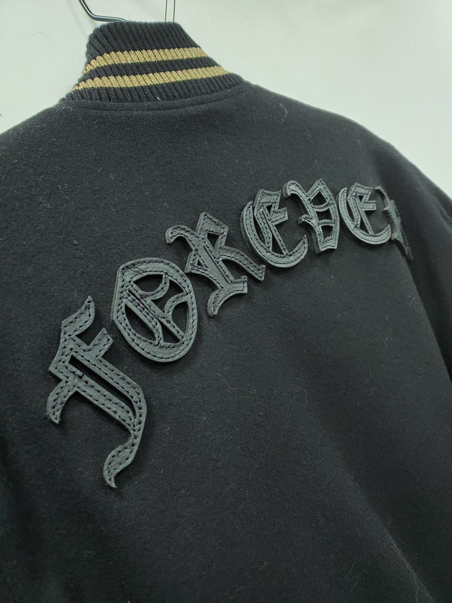 Amiri Long-sleeved Baseball Jacket In Black