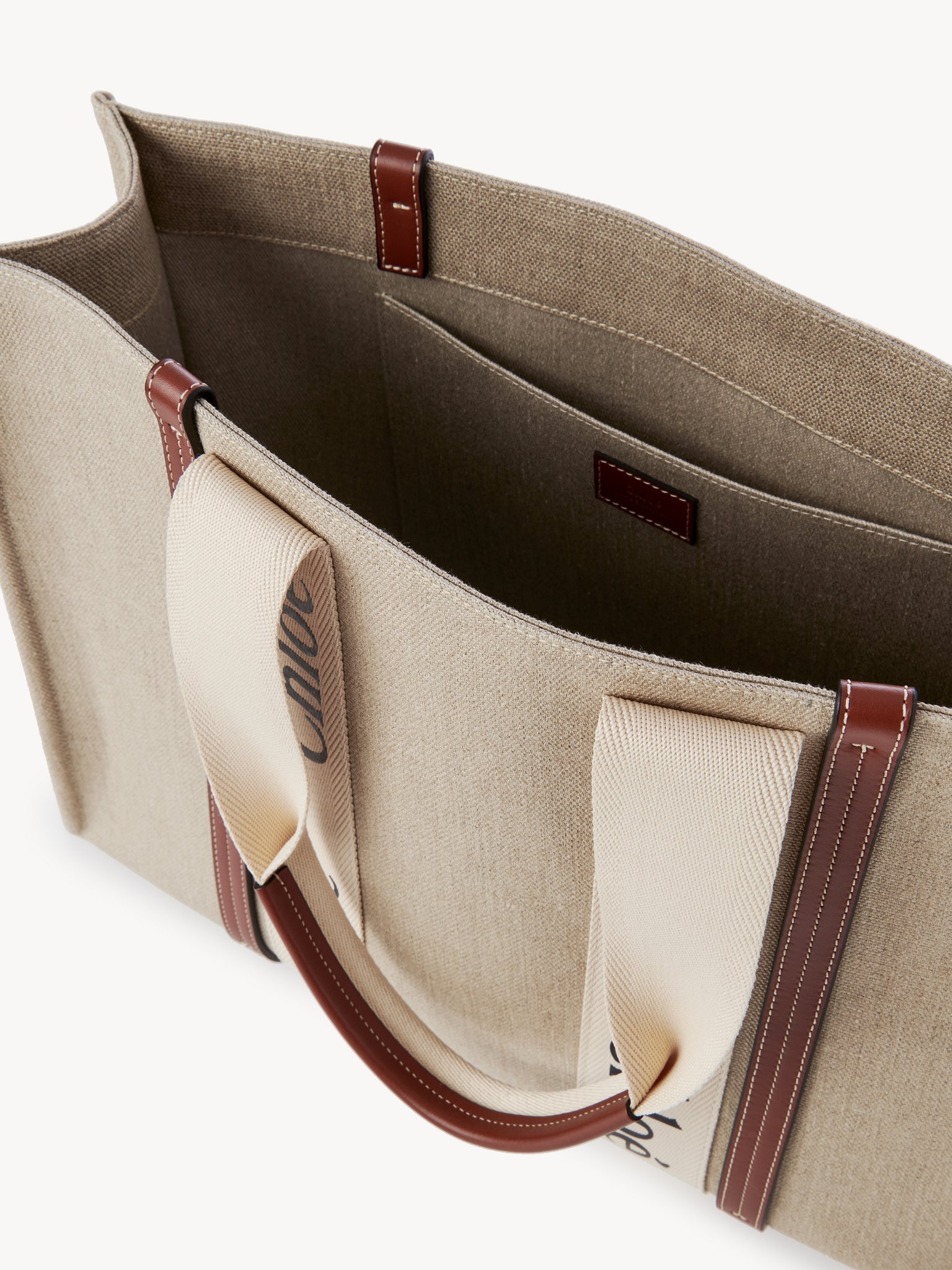 Chloé Structured White Handbag With Bold Branding In Nude