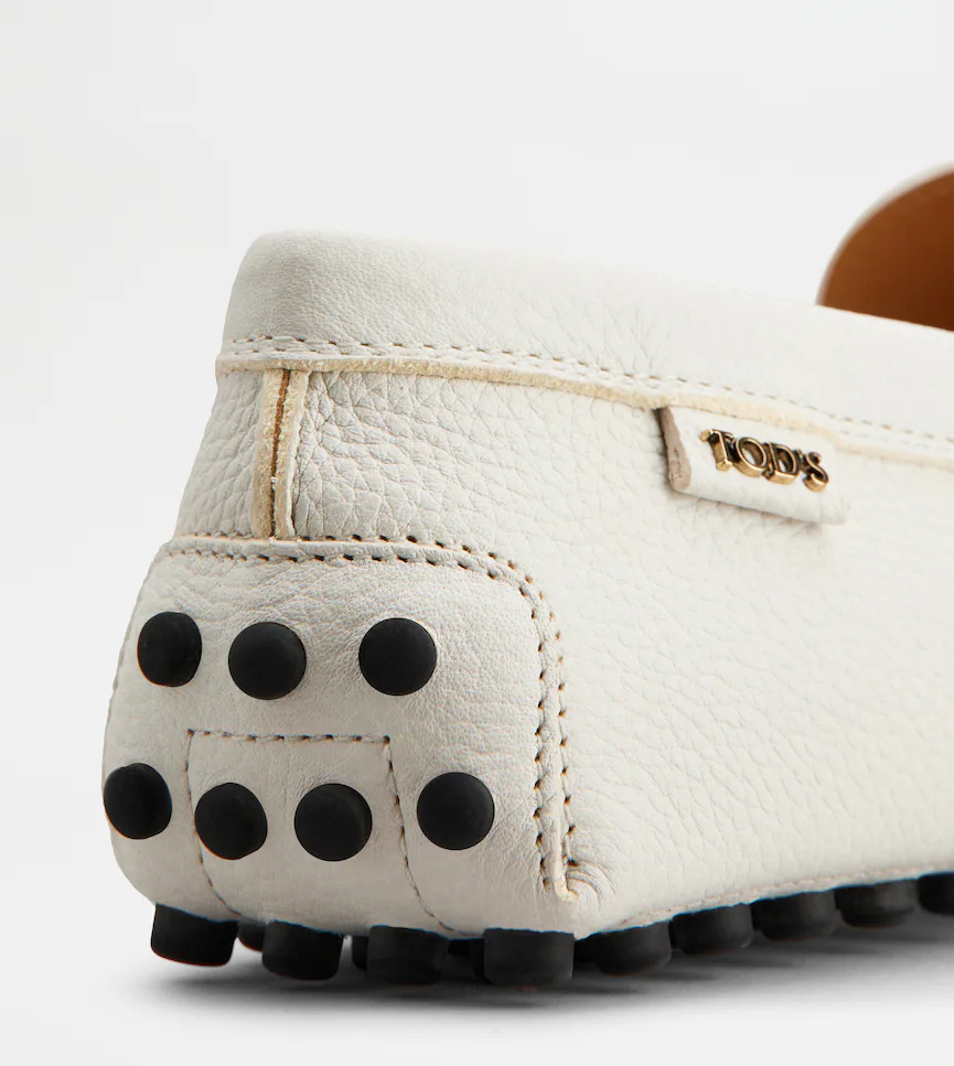 Tod's Gommino Embossed Slip-on Loafers In White