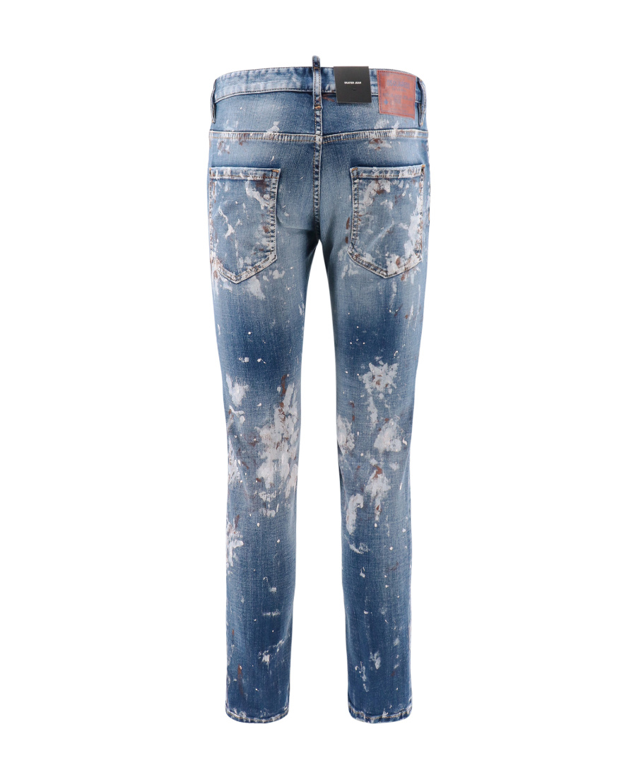 Shop Dsquared2 Paint Splattered Distressed Jeans In Blue