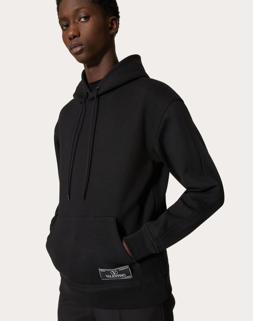 Valentino Logo Patch Drawstring Hoodie In Black