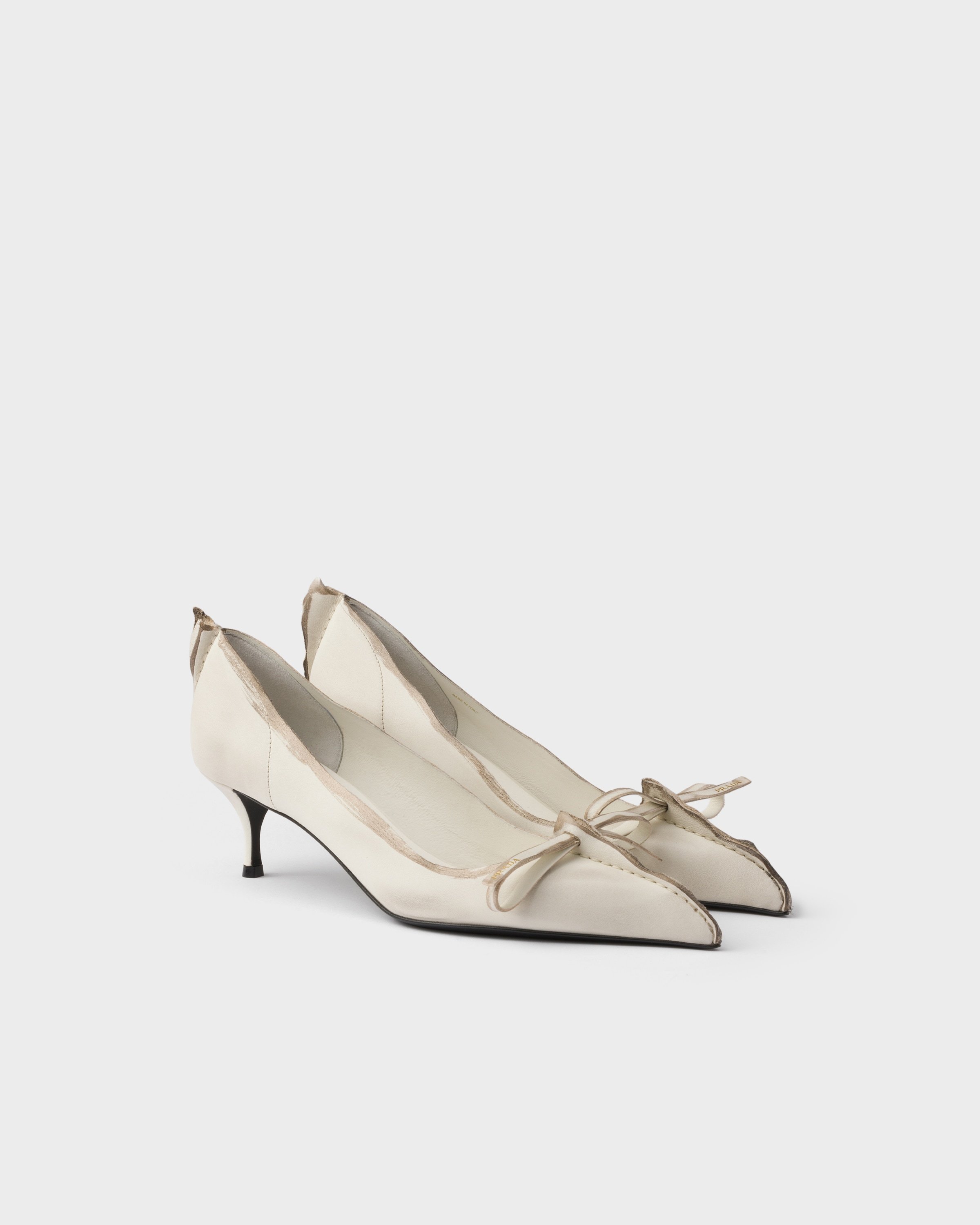 Prada Exposed Seam Kitten Heel Pump In Neutral