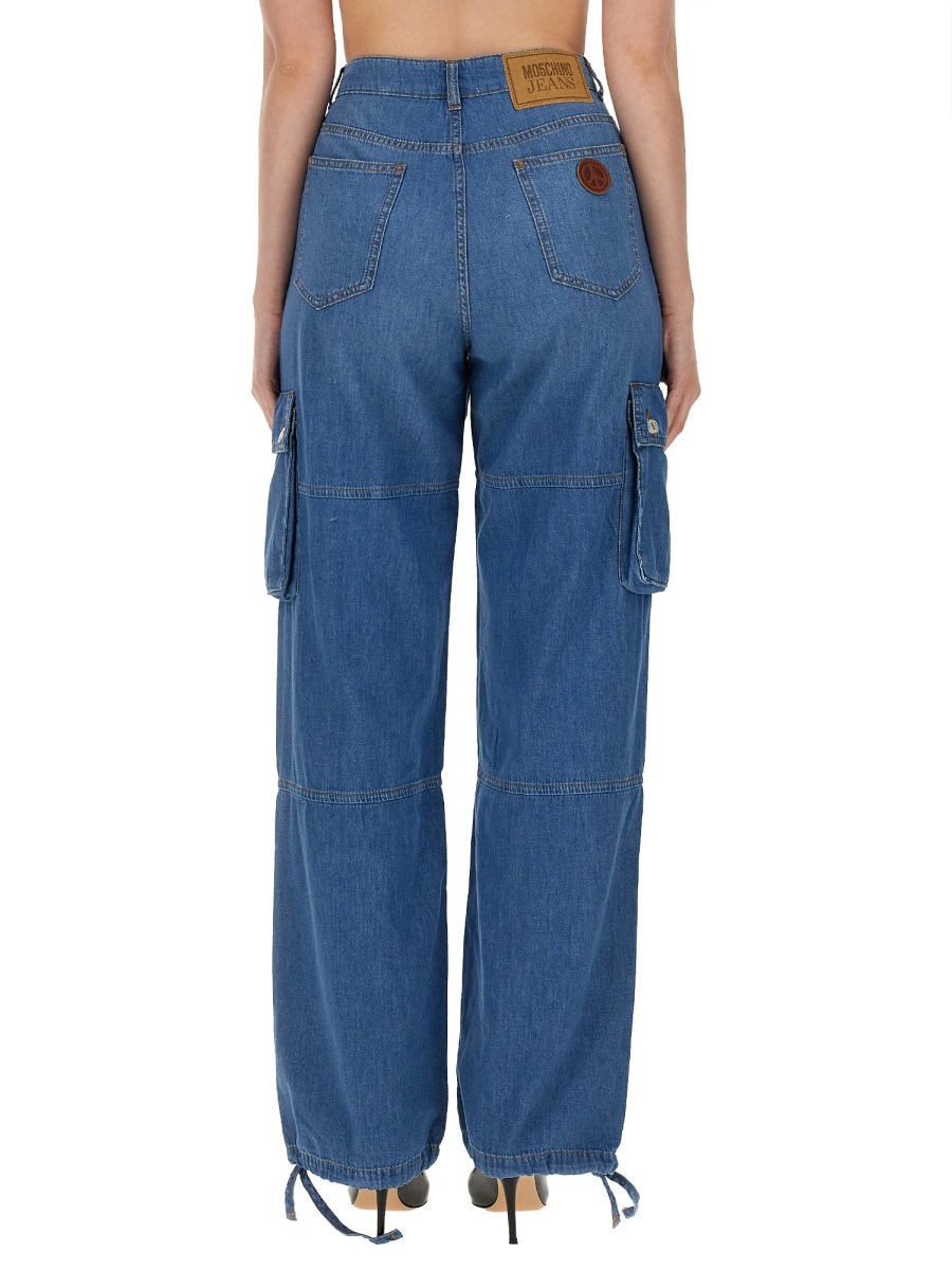 Shop Moschino Belt Loop With Jeans In Blue