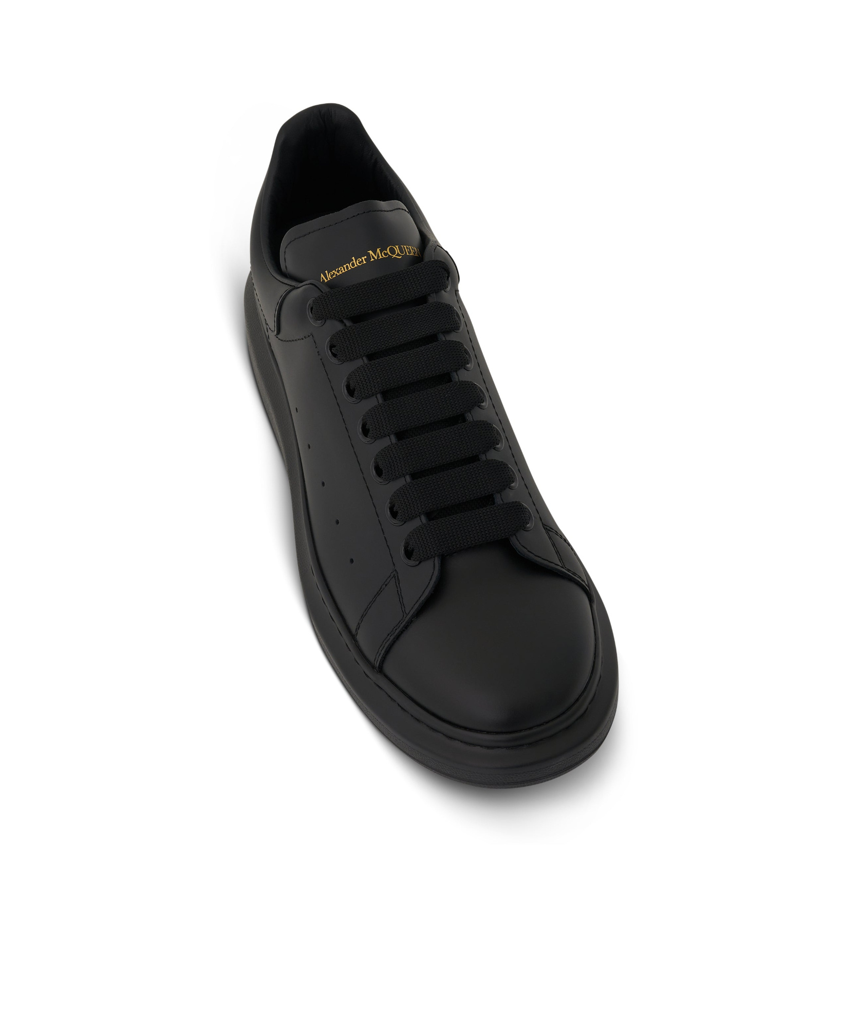 Alexander Mcqueen Black Sneakers With Logo Lettering On The Rear And Oversize Rubber Sole In Leather In Black