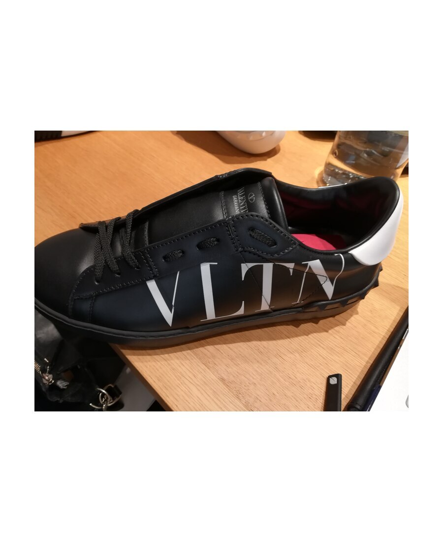 Shop Valentino Vltn Low-top Sneakers In Black