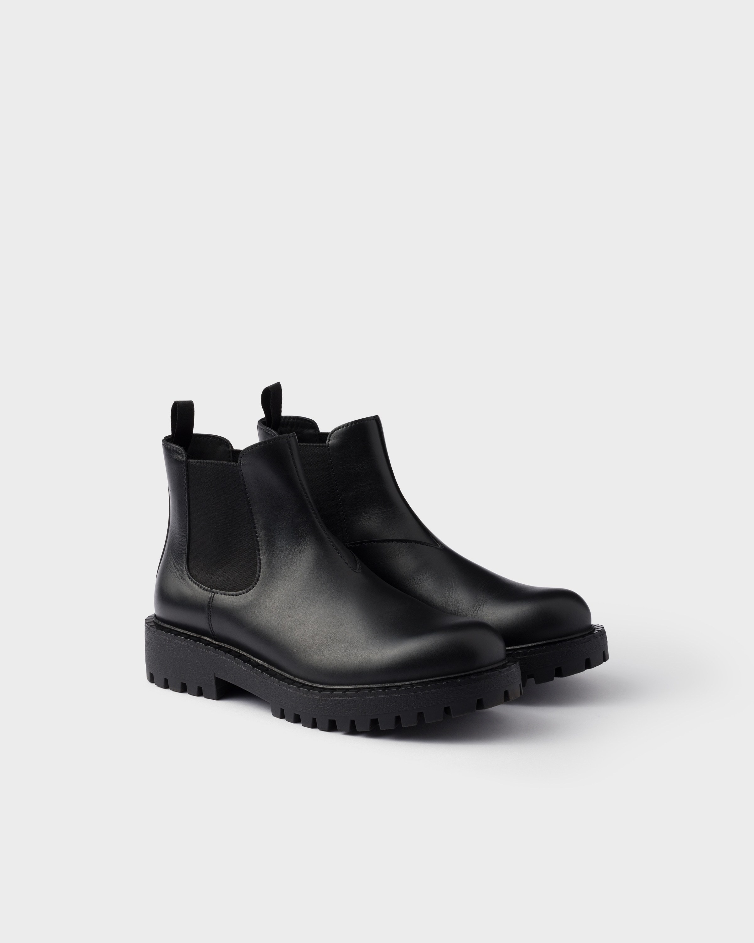 Prada Leather Chelsea Boots In Black