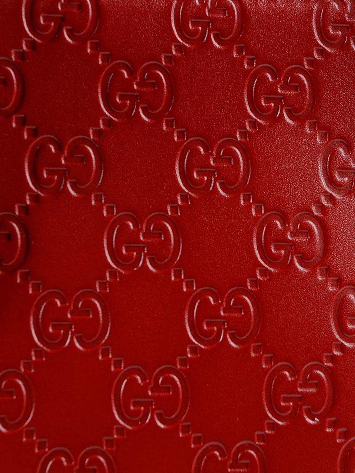 GUCCI GG LOGO EMBOSSED HANDBAG