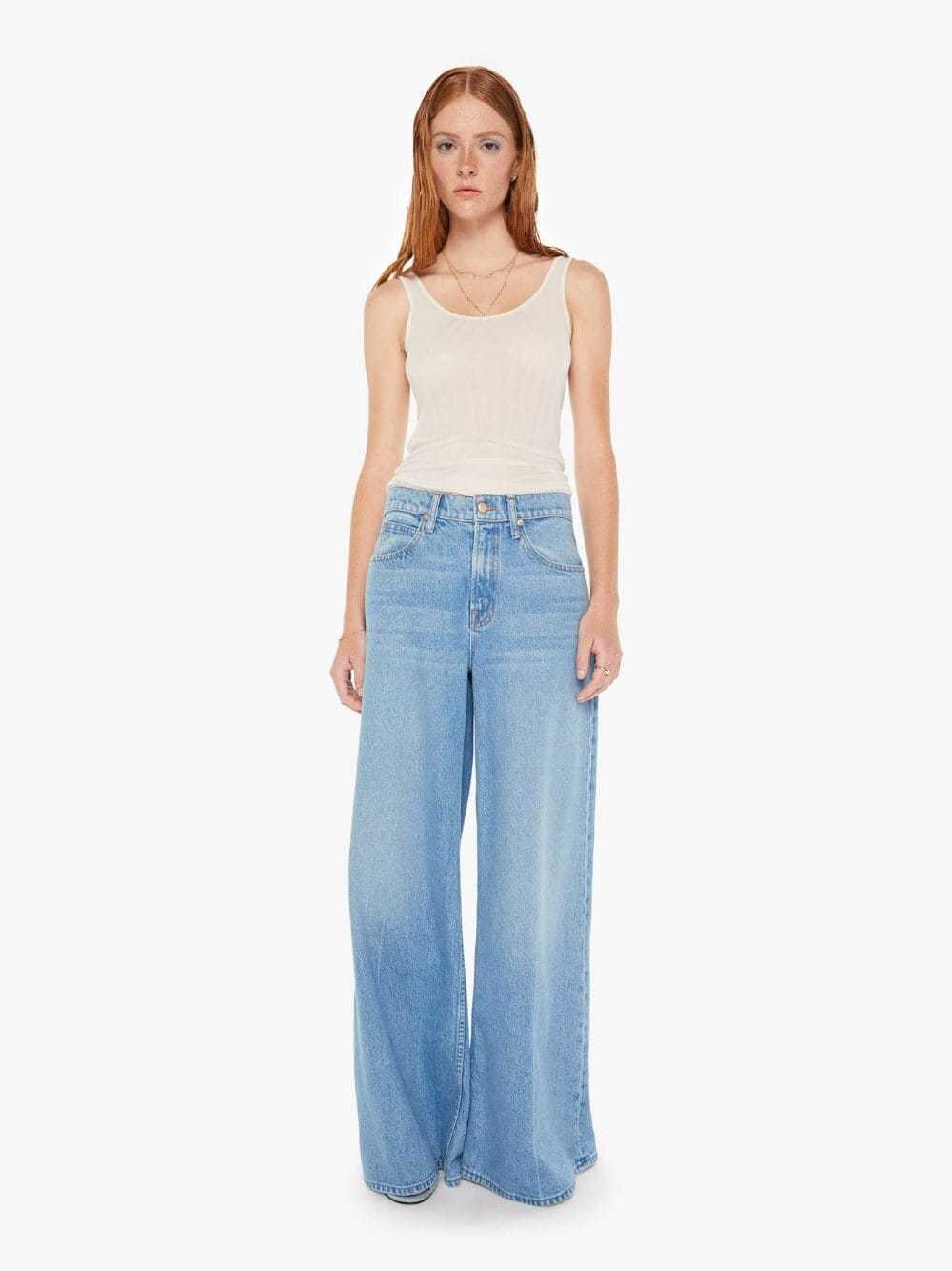 Mother Slung Sugar Cone Sneak Low-rise Flared Jeans In Blue