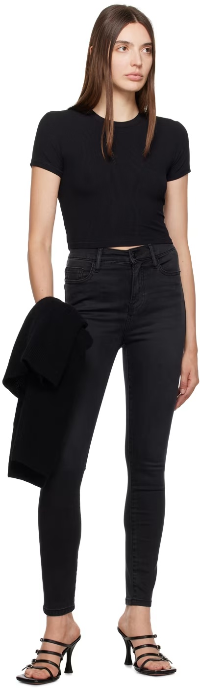 Shop Frame High-rise Skinny Jeans In Black