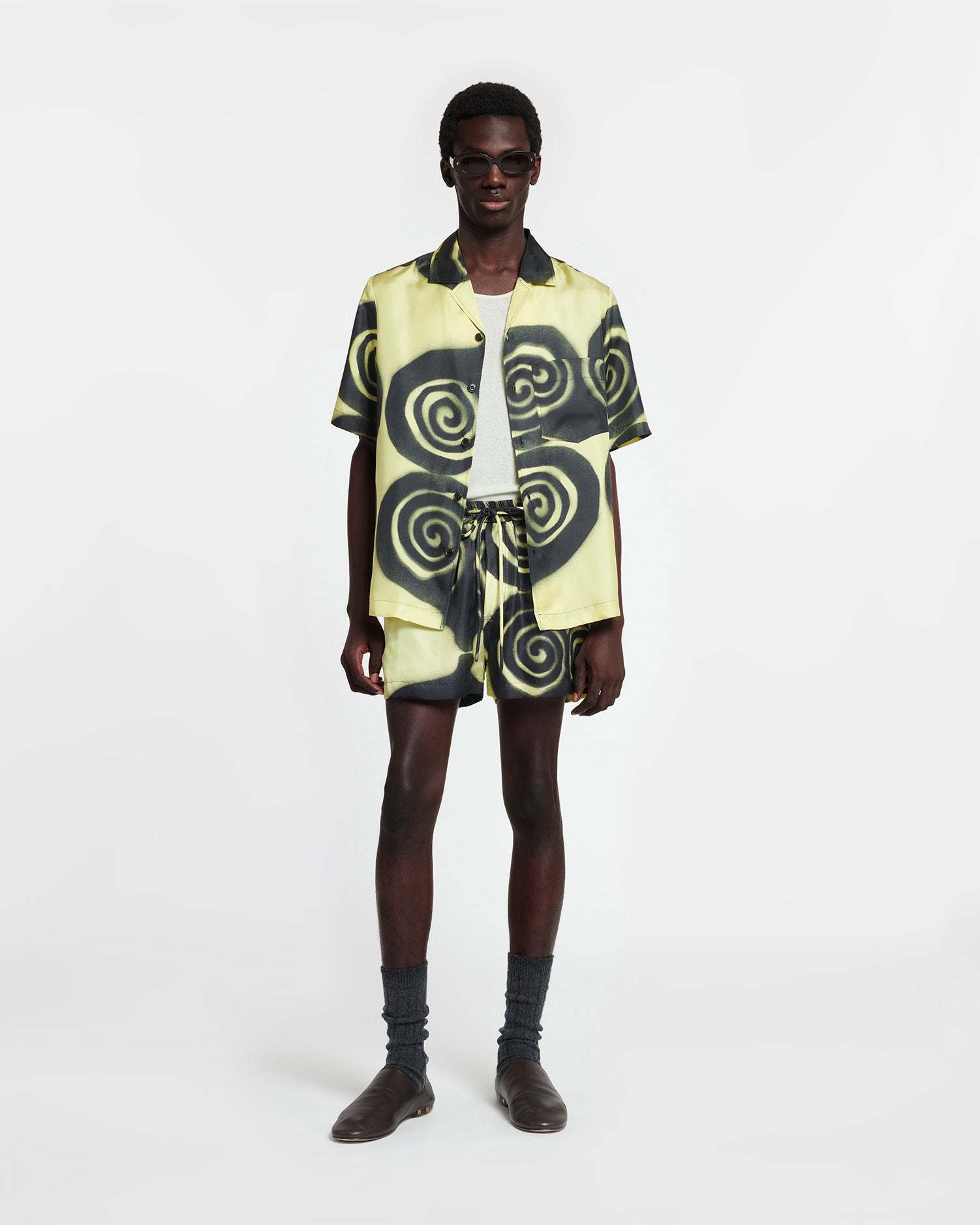 Nanushka Amil Spiral-print Silk Shorts In Black