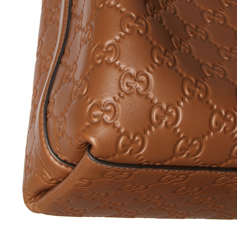 Gucci Gg Emblem Small Bucket Bag In Brown
