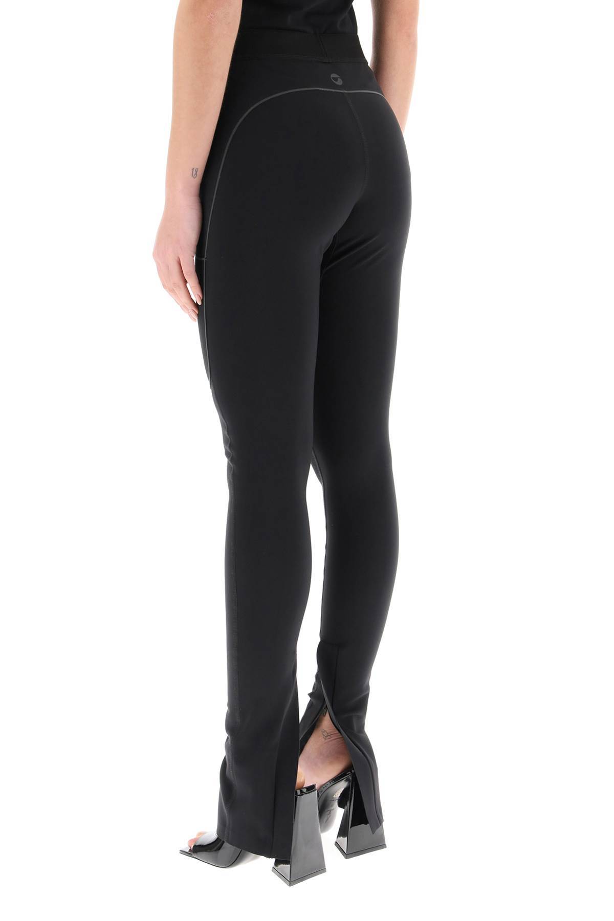 Coperni Stretch-design Slit Leggings In Black