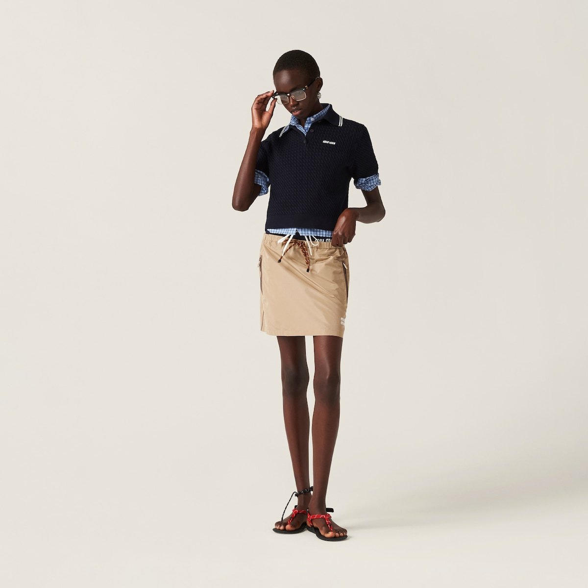 Miu Miu Raised-logo A-line Miniskirt In Nude