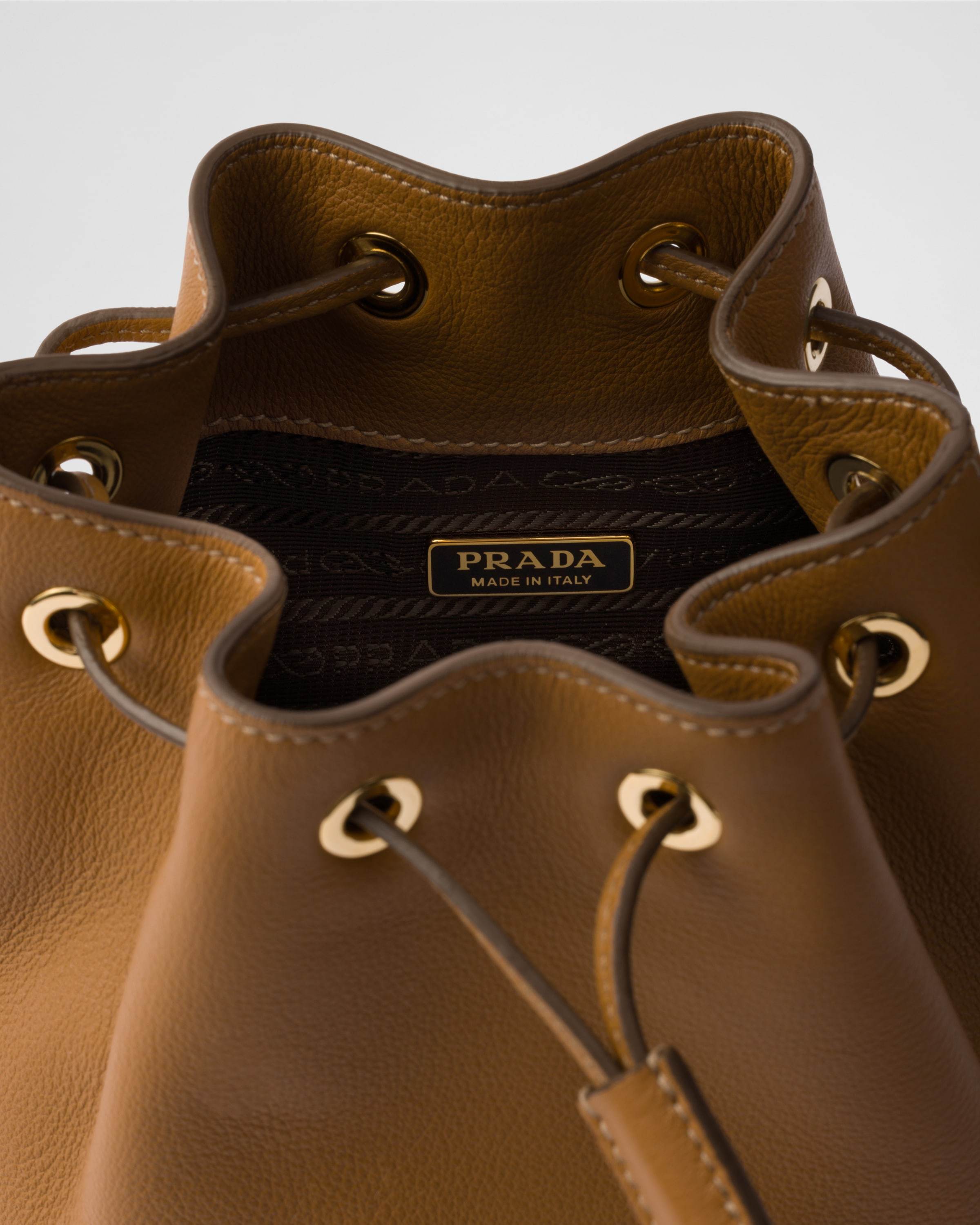 Prada Mini Drawstring Shoulder Bag In Brown