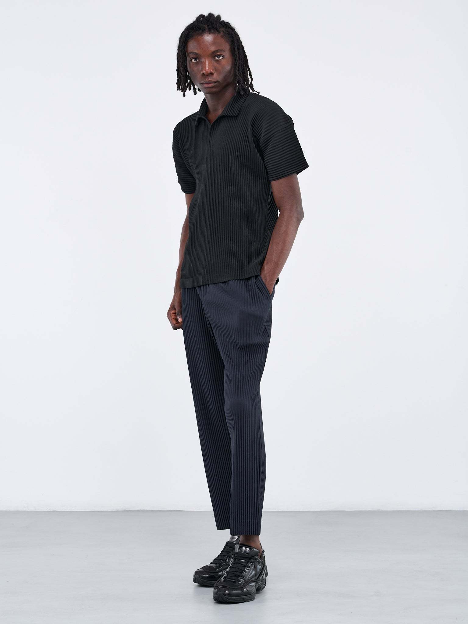 Shop Issey Miyake Straight-leg Pleated Trousers In Black