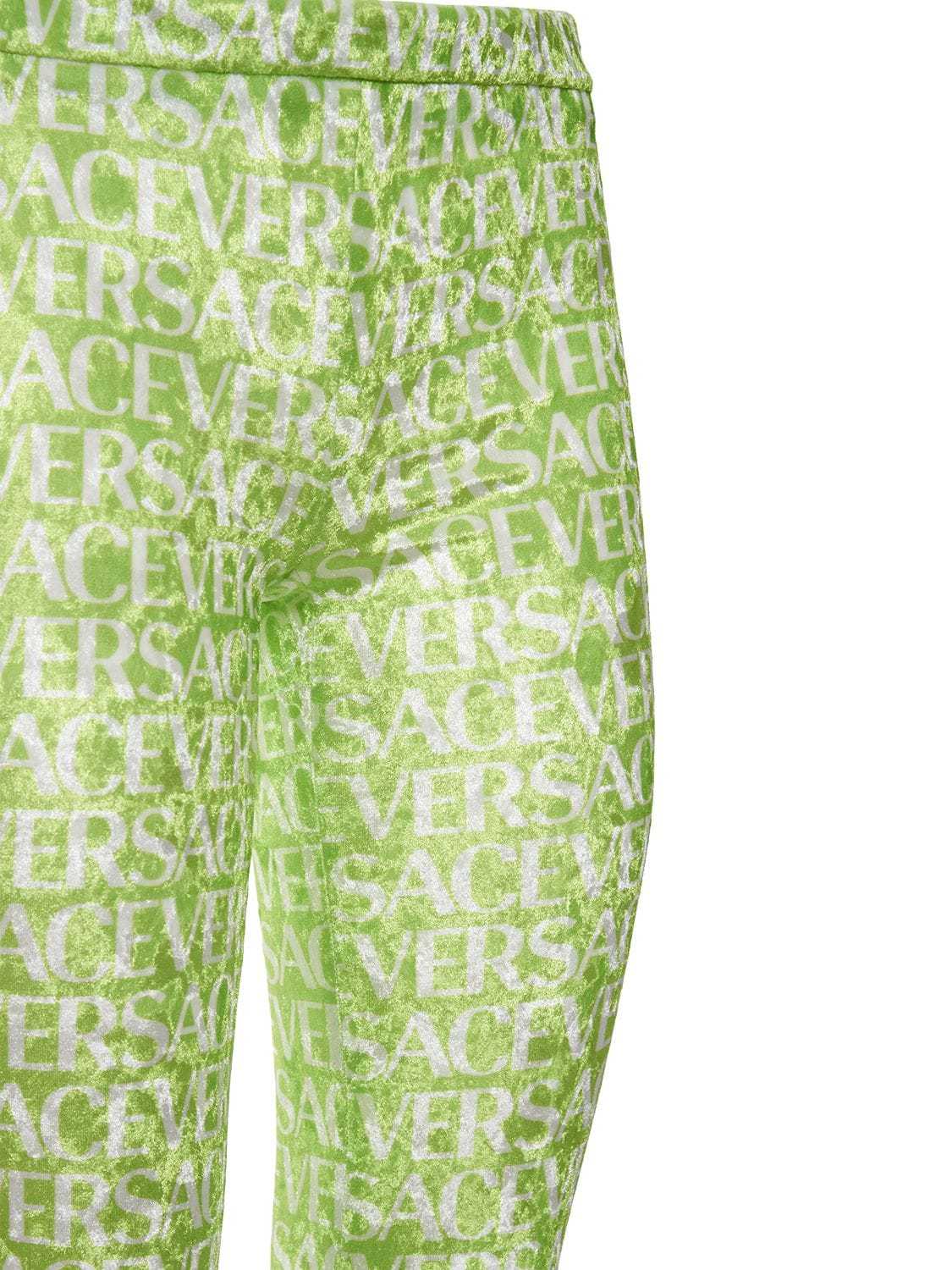 Versace Logo-print Flared Trousers In Green