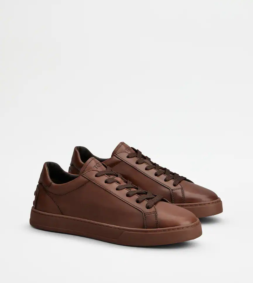 Tod's Allacciata Cassetta Rubber-trimmed Glossed-leather Sneakers In Brown