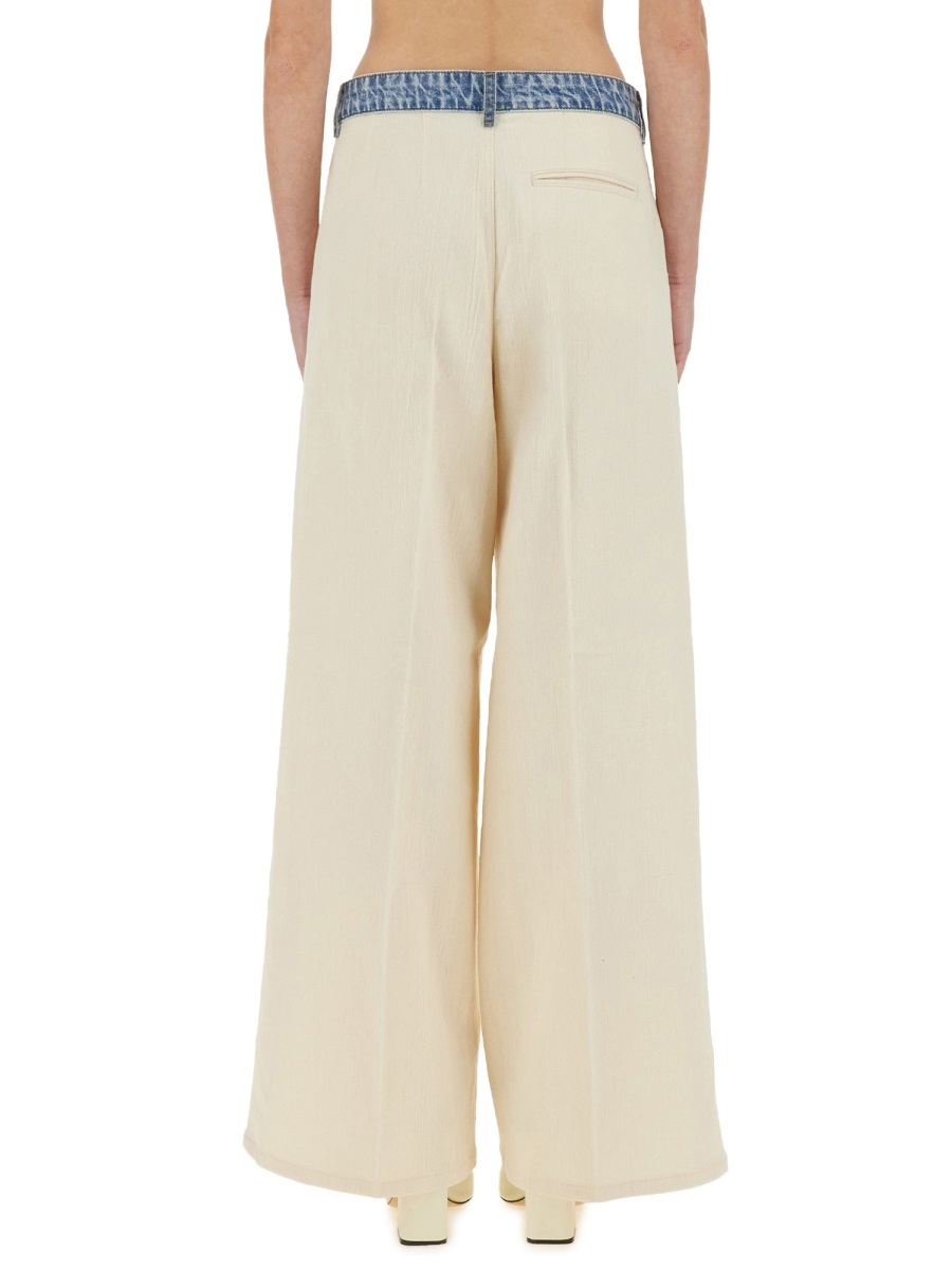 Moschino Urban Wide Fit Pleated Trousers In Neutral