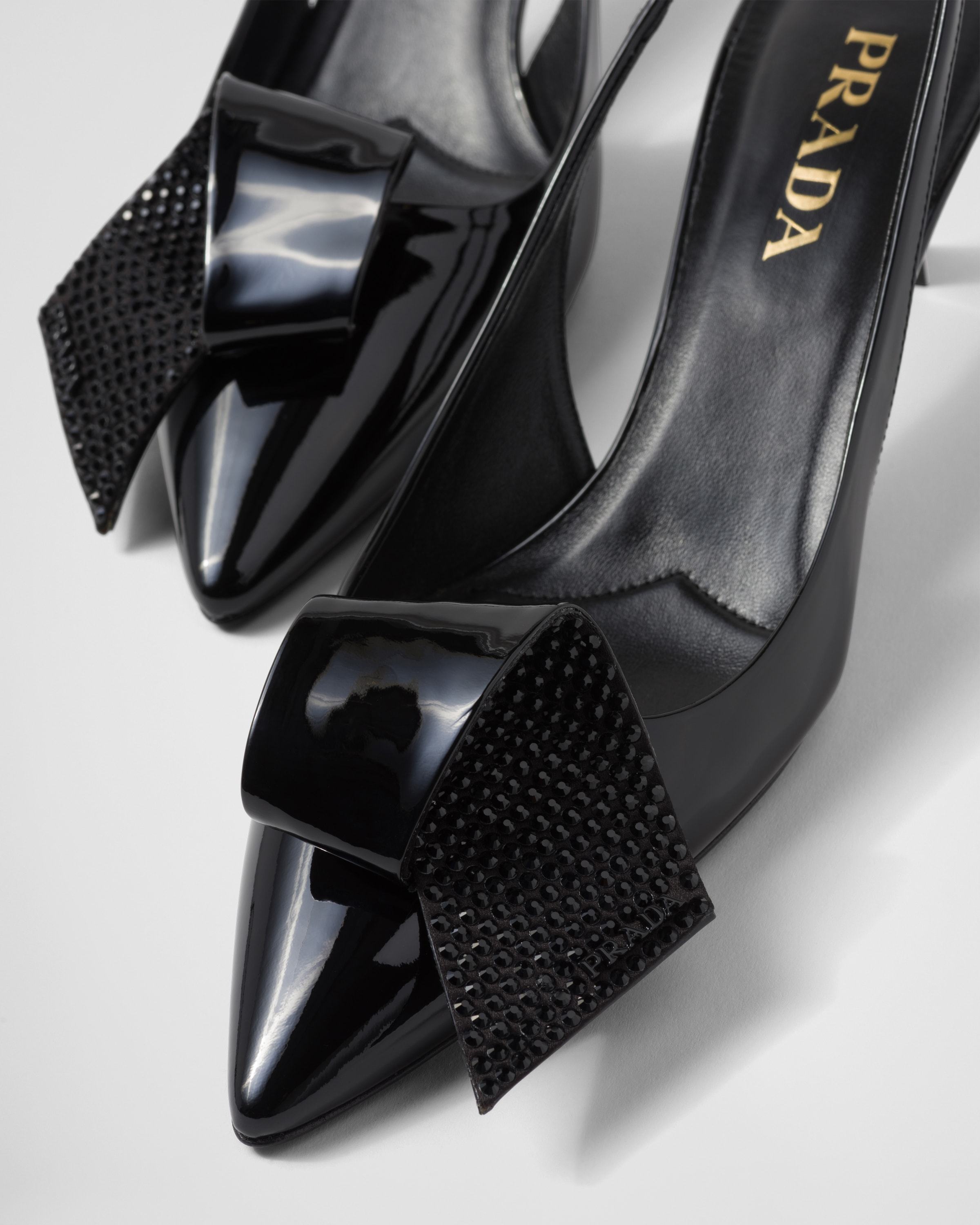 Prada 55 Slingback Pumps In Patent Leather In Black