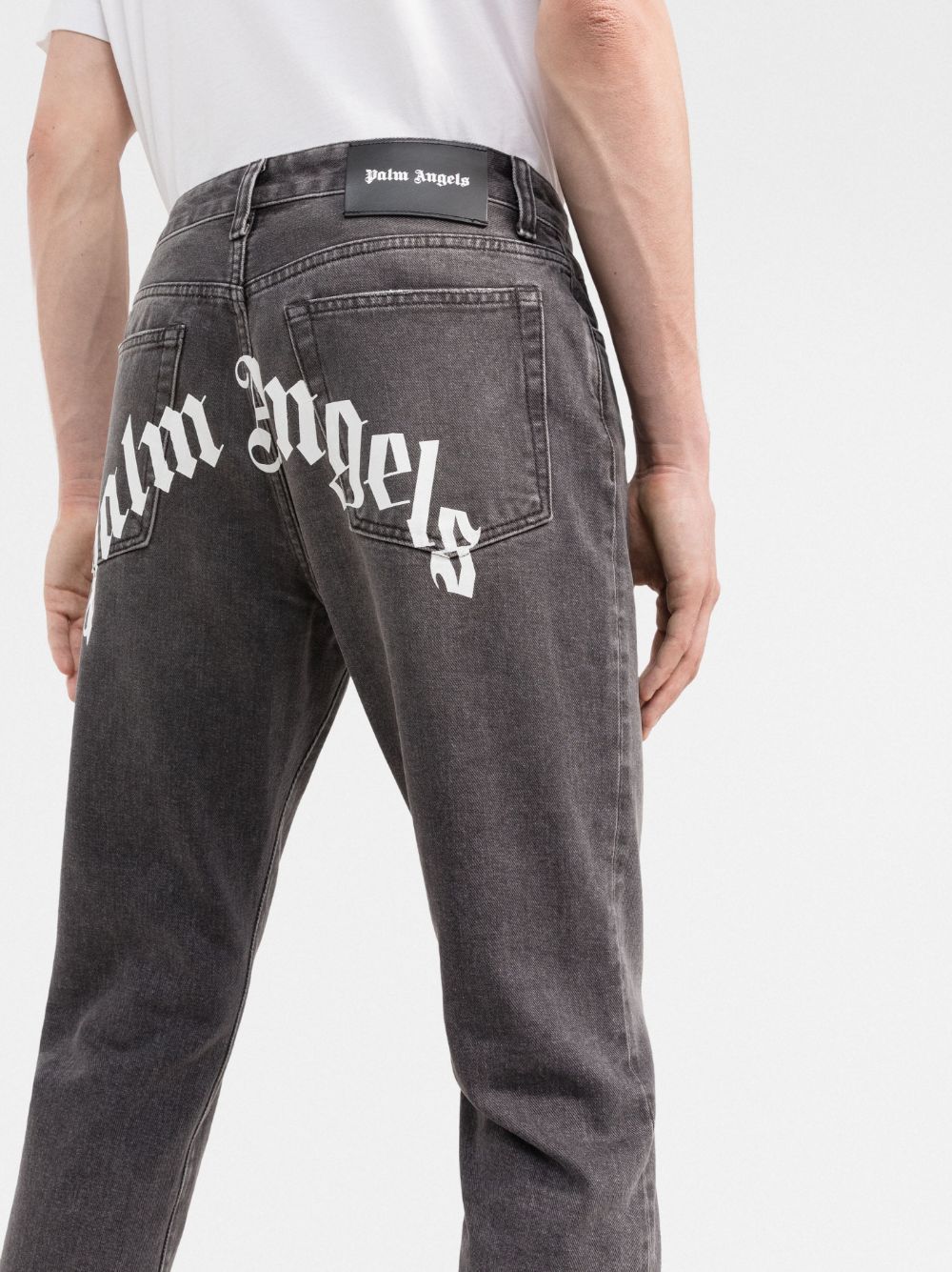 PALM ANGELS PALM ANGELS LOGO PRINTED STRAIGHT LEG JEANS