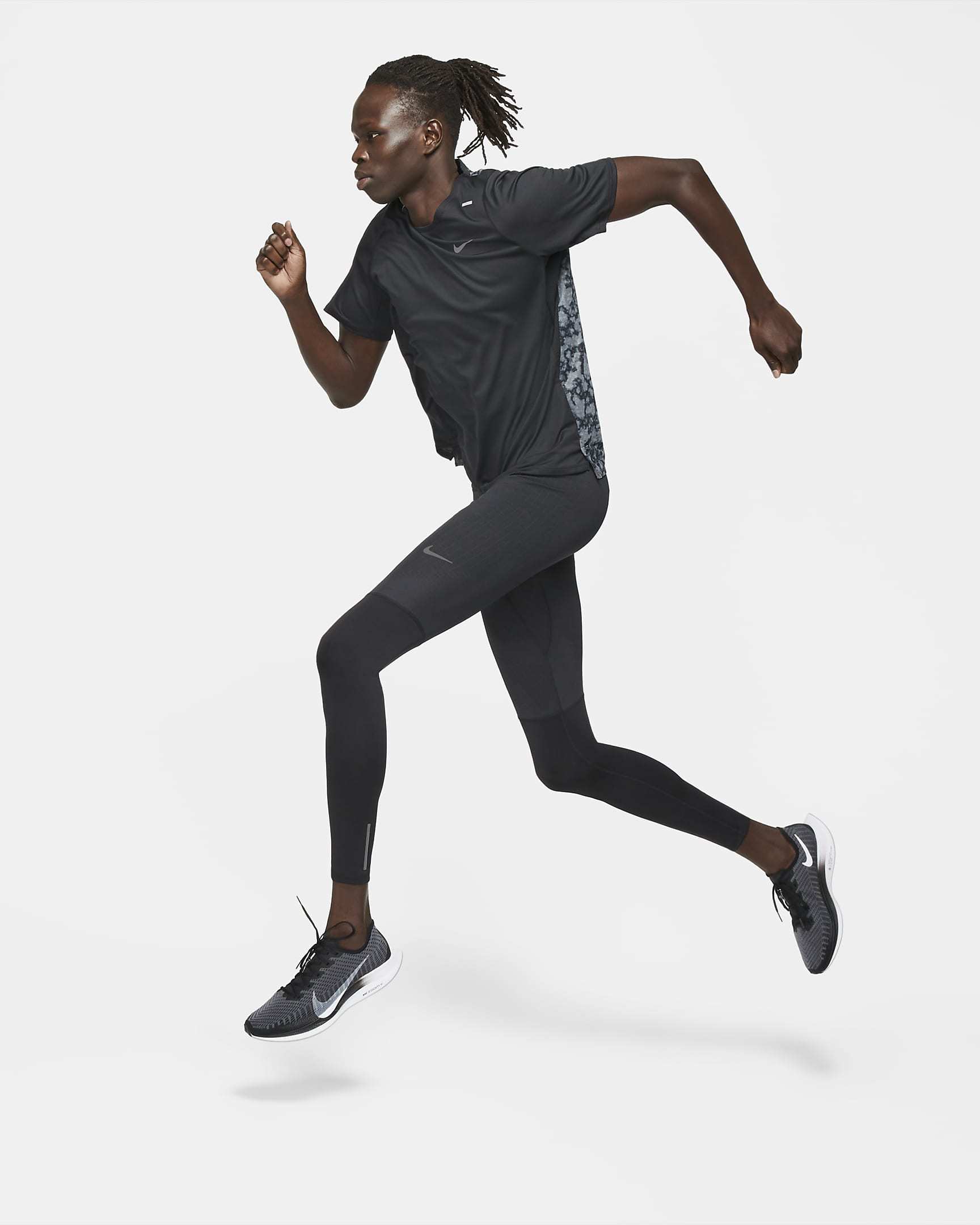 Shop Nike Swoosh Detail Stretch-leggings In Black
