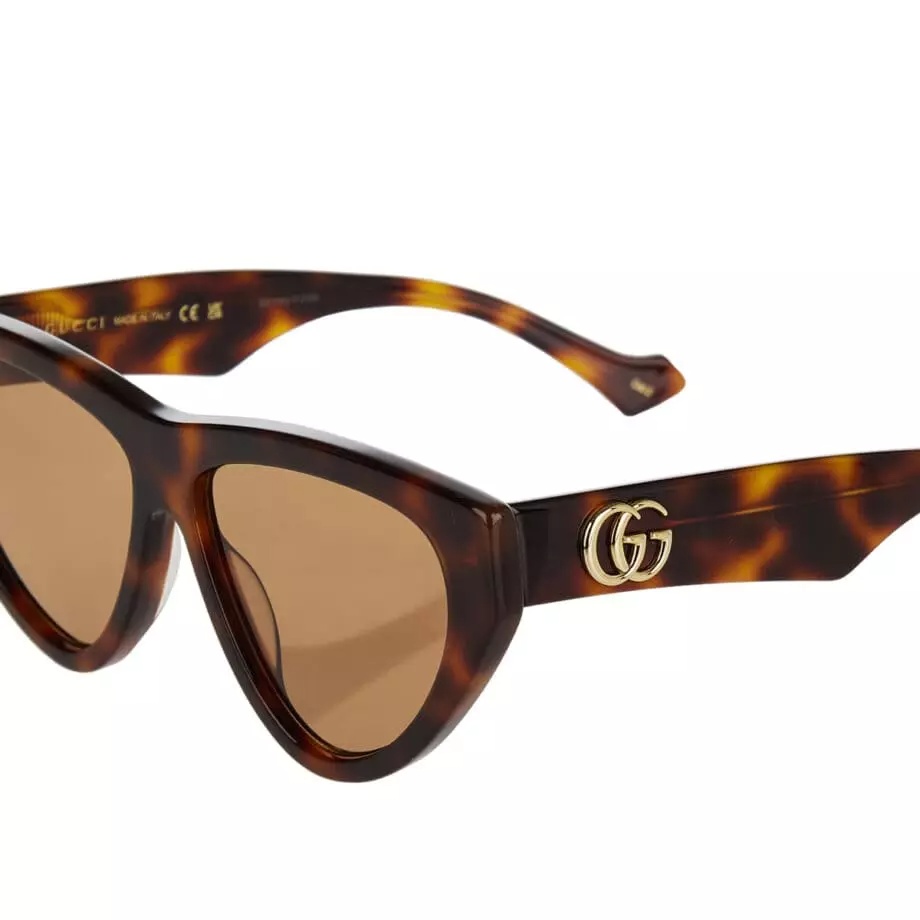Shop Gucci Tortoiseshell Cat-eye Sunglasses In Brown