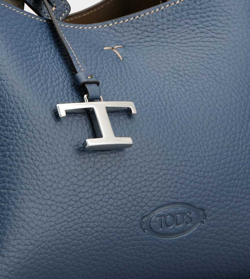 Tod's Leather Micro Clutch Bag Detachable Strap In Blue