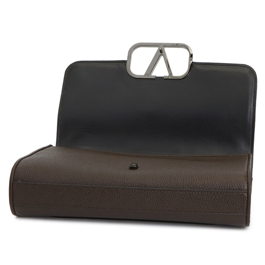 Shop Valentino Flip Shoulder Bag In Brown