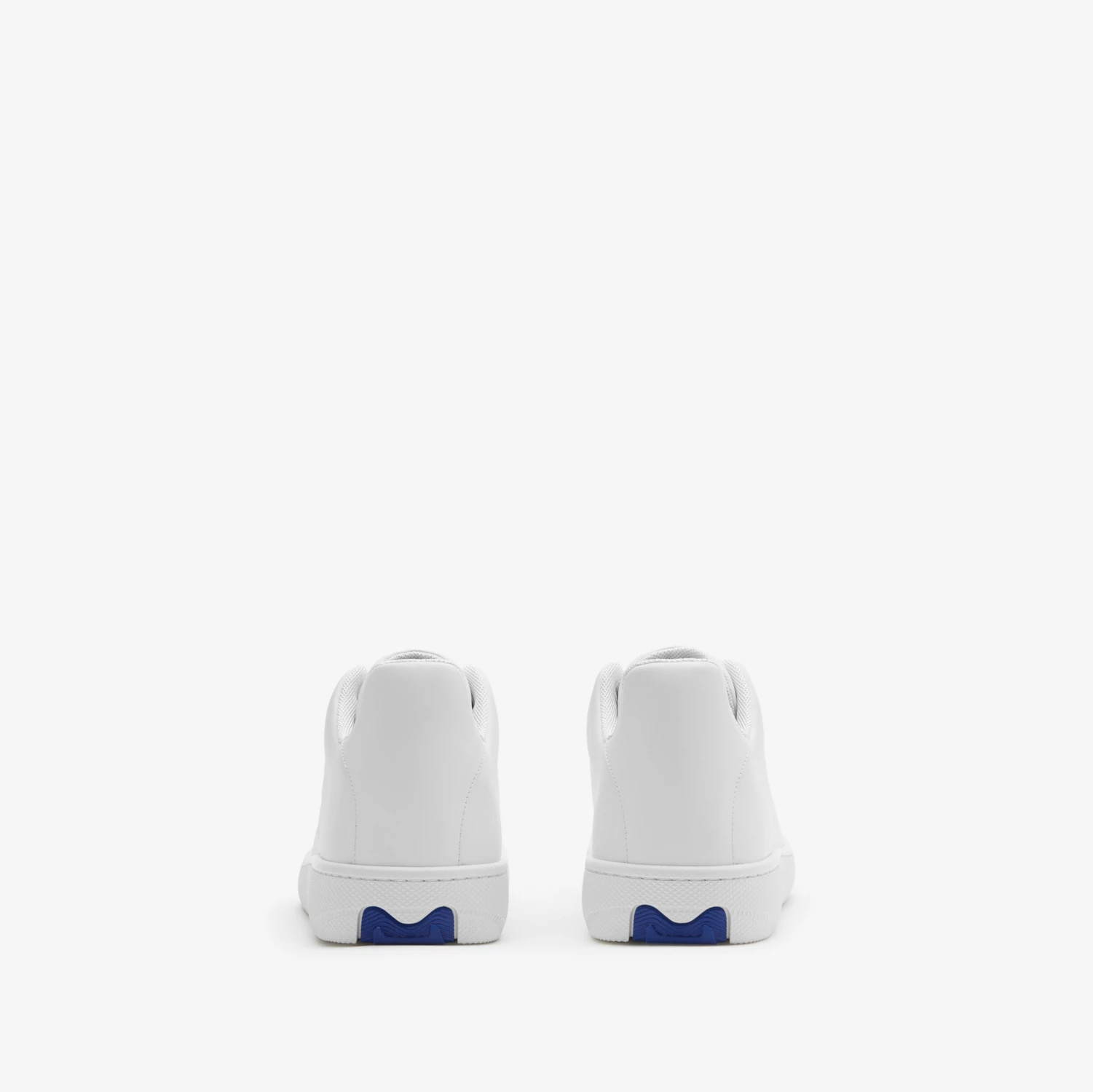 Shop Burberry Debossed-logo Leather Sneakers In White
