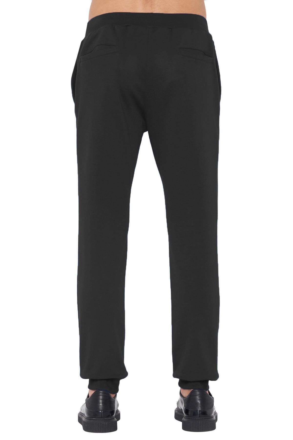 Versace Logo Sports Leg Retractor Pants In Black