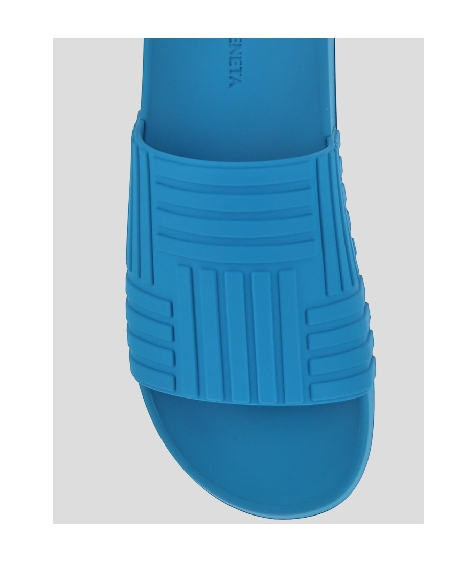 Bottega Veneta Debossed Rubber Slides In Blue