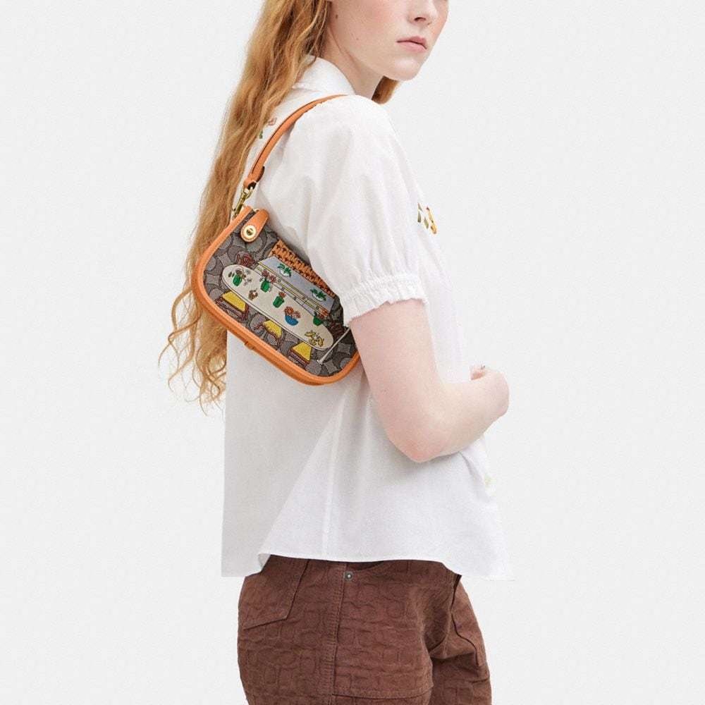 COACH SWINGER 20 HANDBAG
