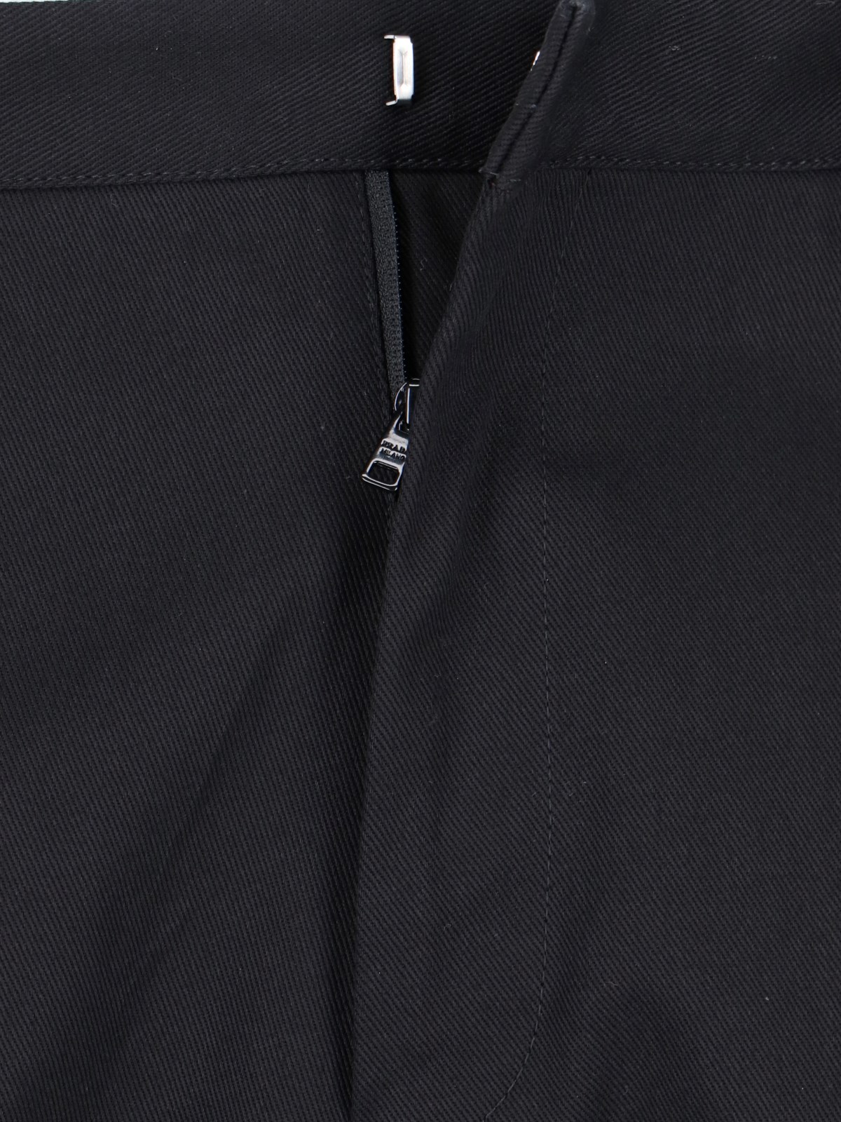 Prada Triangle-logo Tapered-leg Jeans In Black