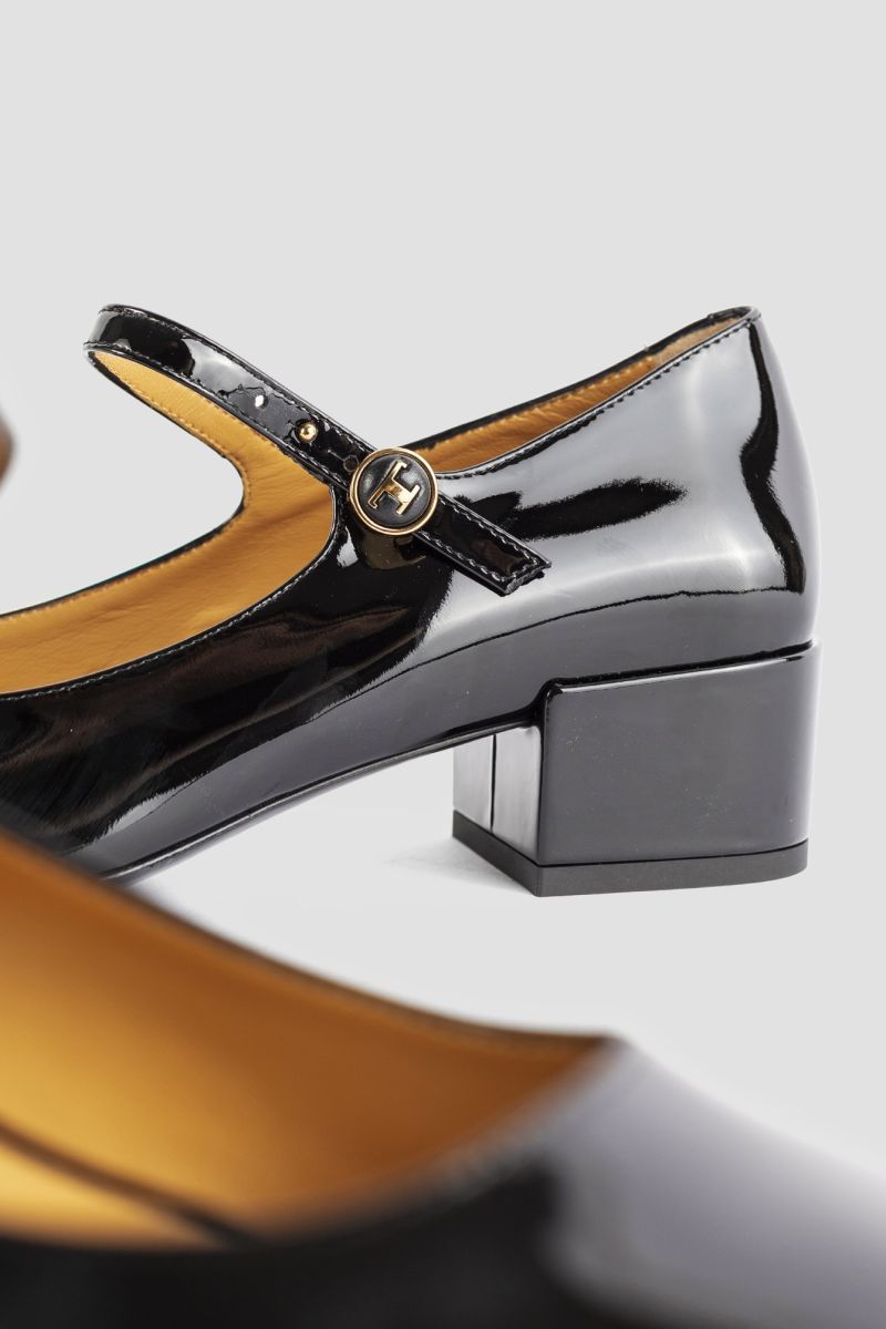 Tod's Almond Toe Block Heel Gold Hardware Pumps In Black