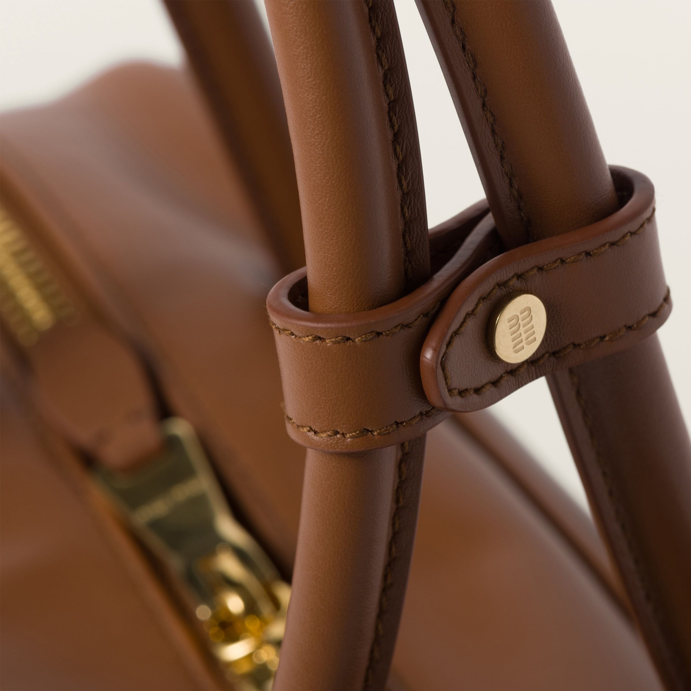 Miu Miu Logo Pattern Shoulder Bag In Brown