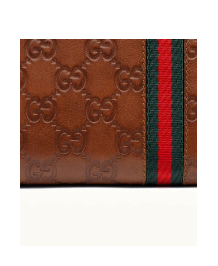 GUCCI LONG ZIPPER WALLET.