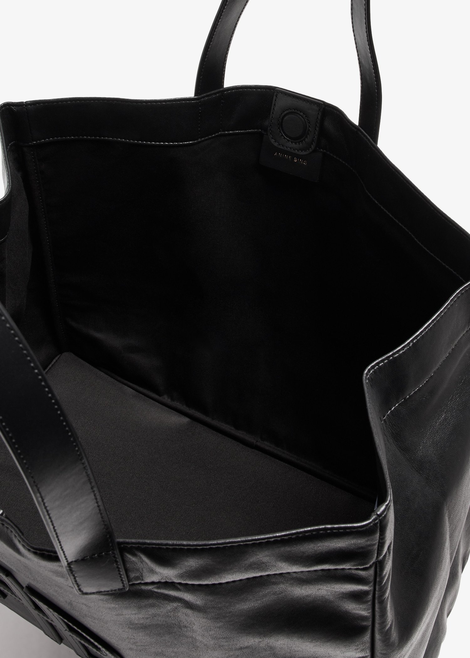 Shop Anine Bing Large Rio Faux Leather Tote Bag In Black