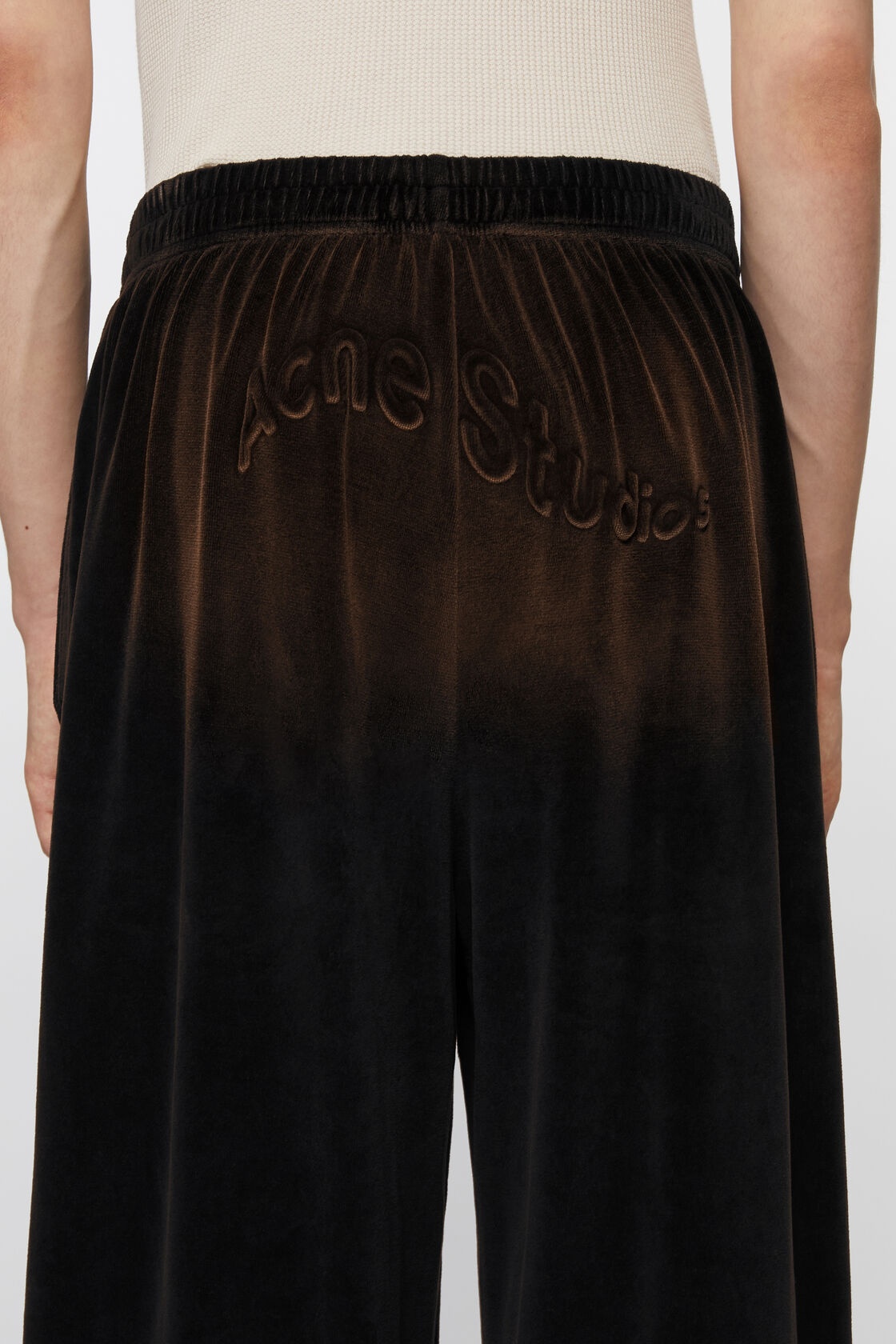 Acne Studios Logo-embossed Velvet Trousers In Black