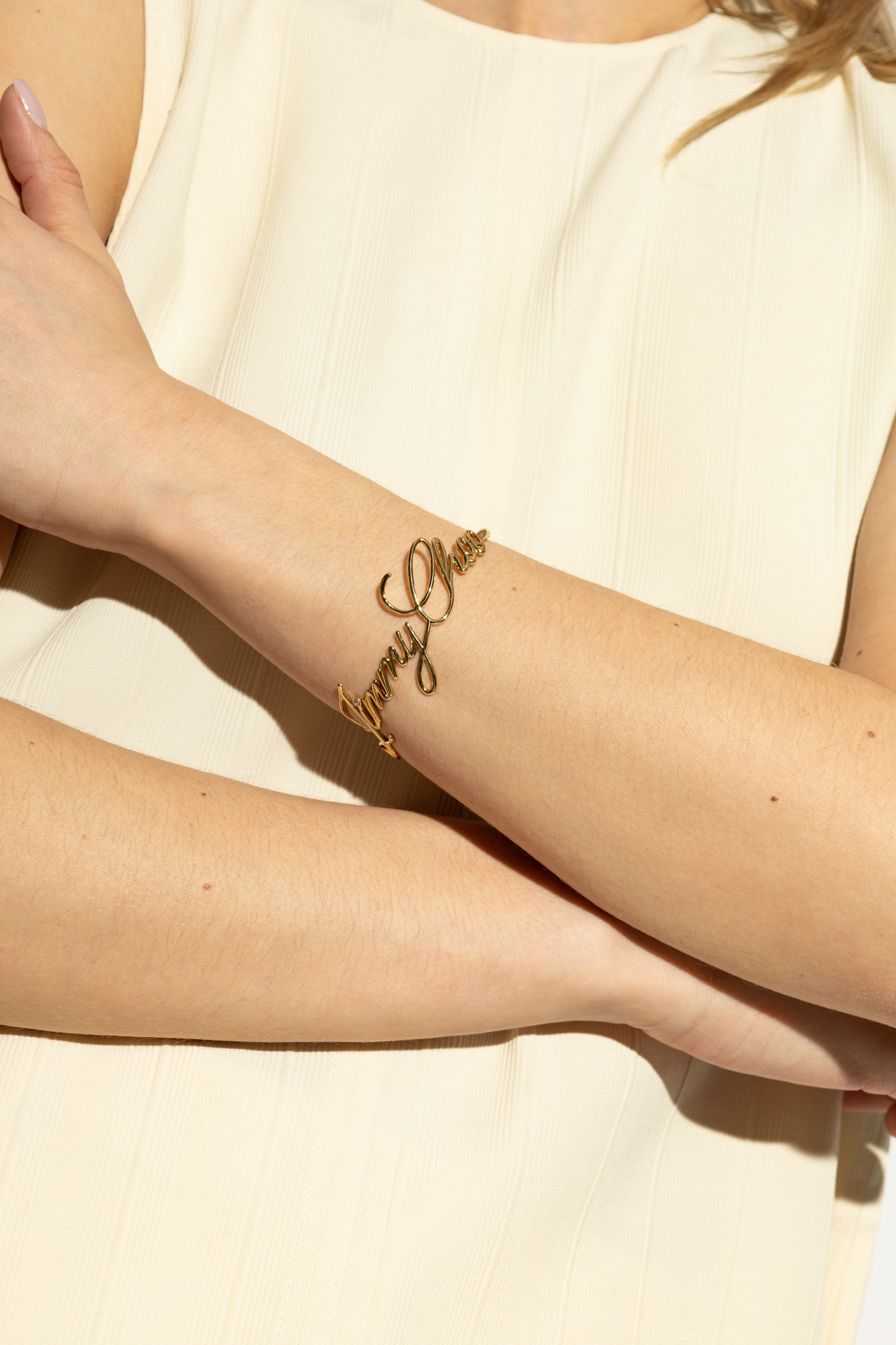 Jimmy Choo Logo Script Bracelet In Yellow
