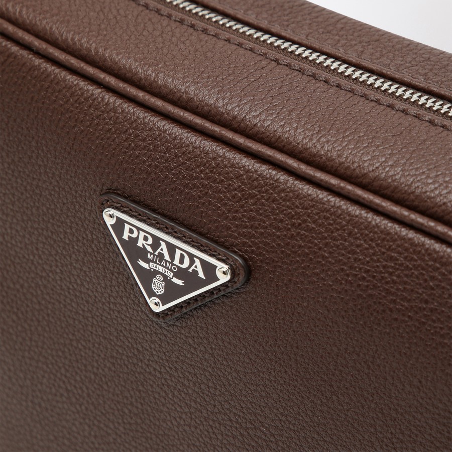 Prada Triangle Logo Leather Messenger Bag In Brown