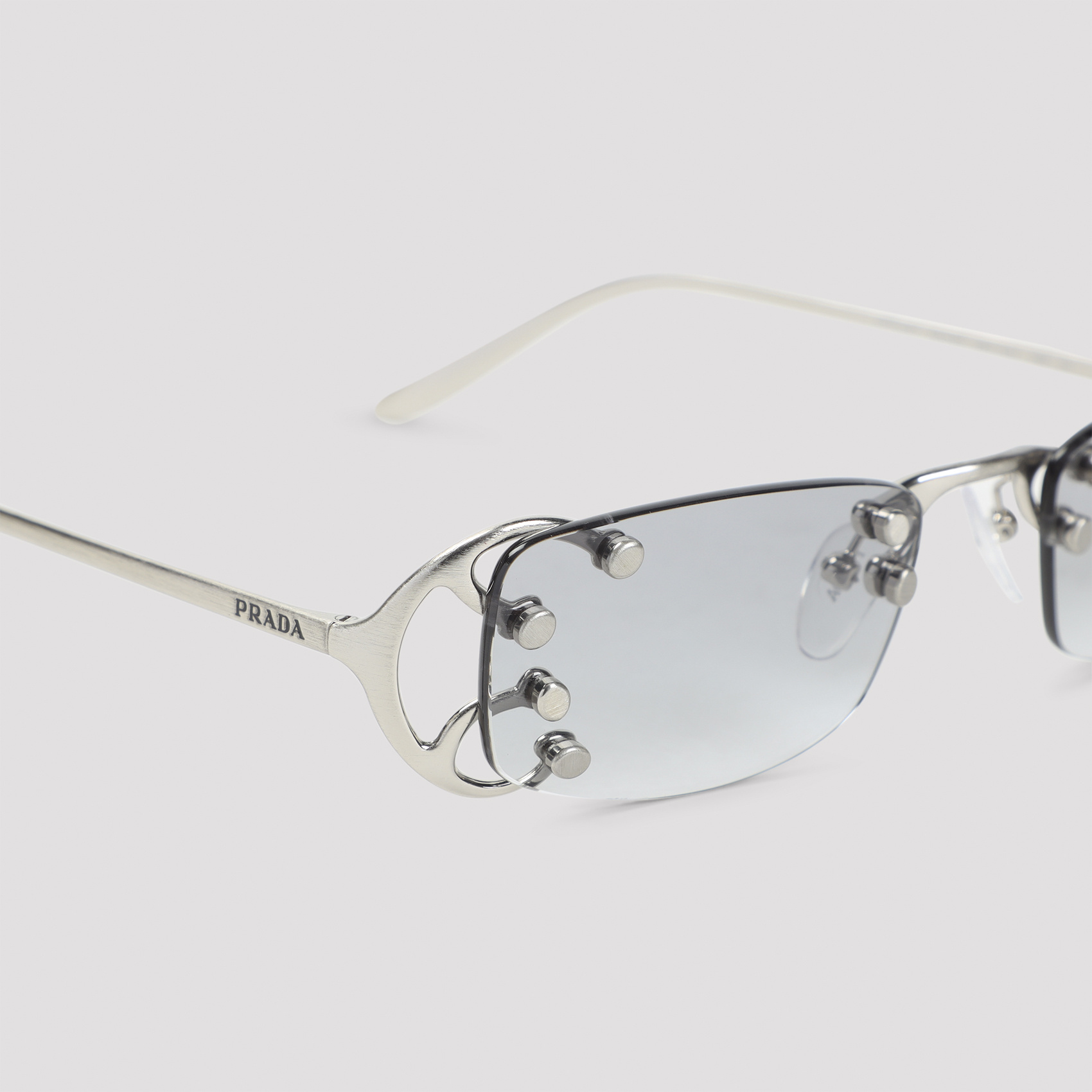 Prada Rimless Rectangular Sunglasses With Polished Metal Frames In Gray
