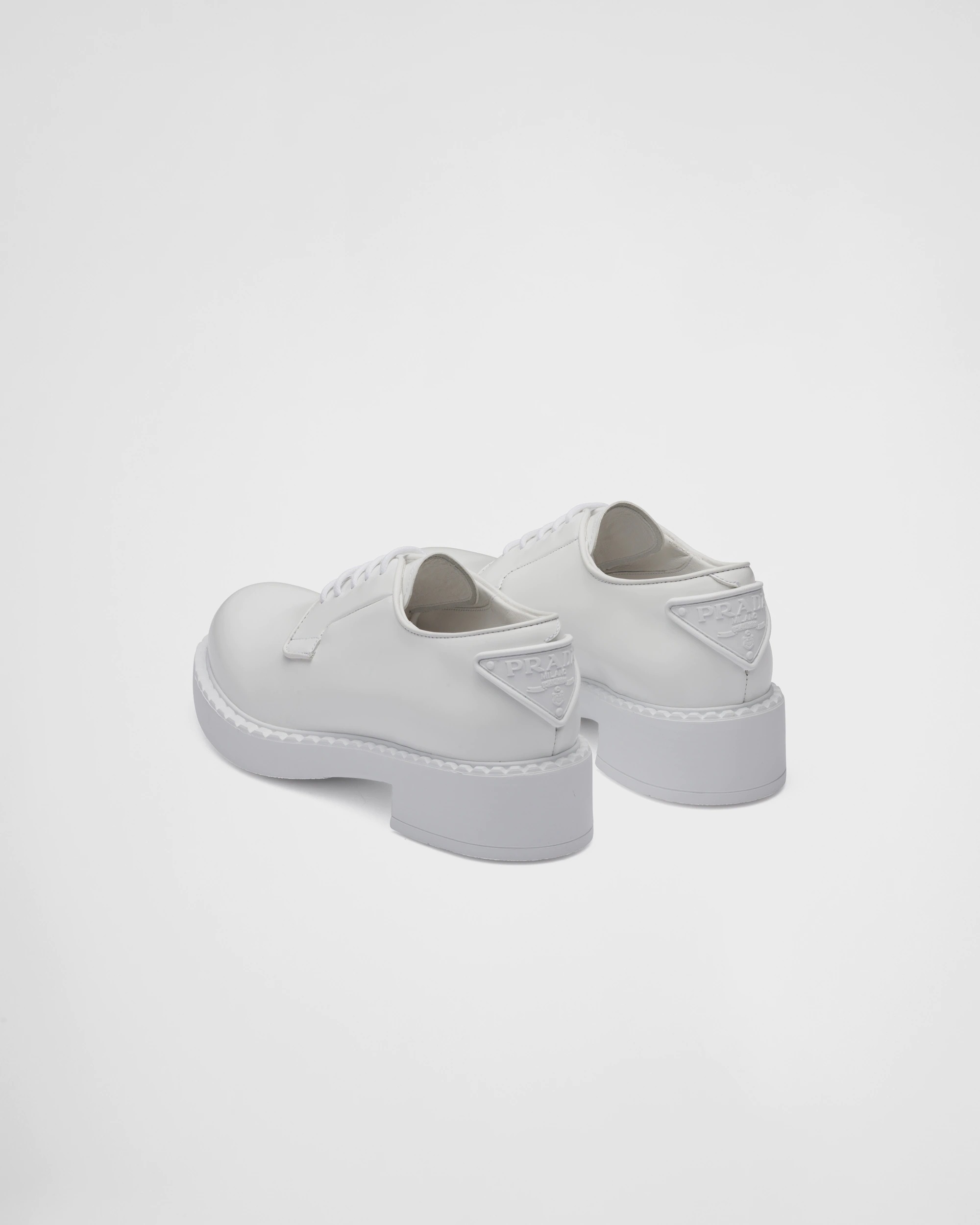 Prada Logo Lace Derby Shoes In White